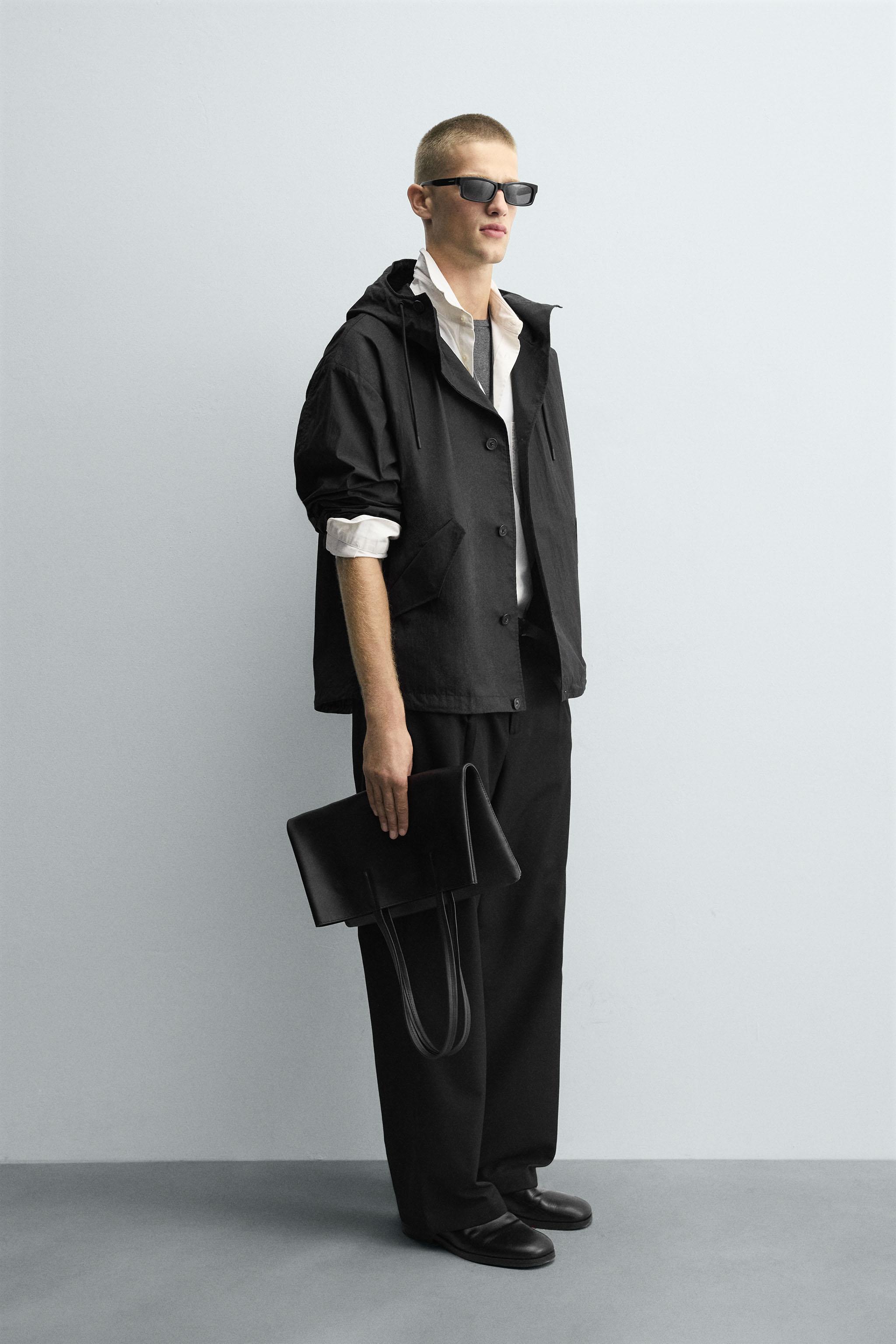 HOODED TECHNICAL JACKET