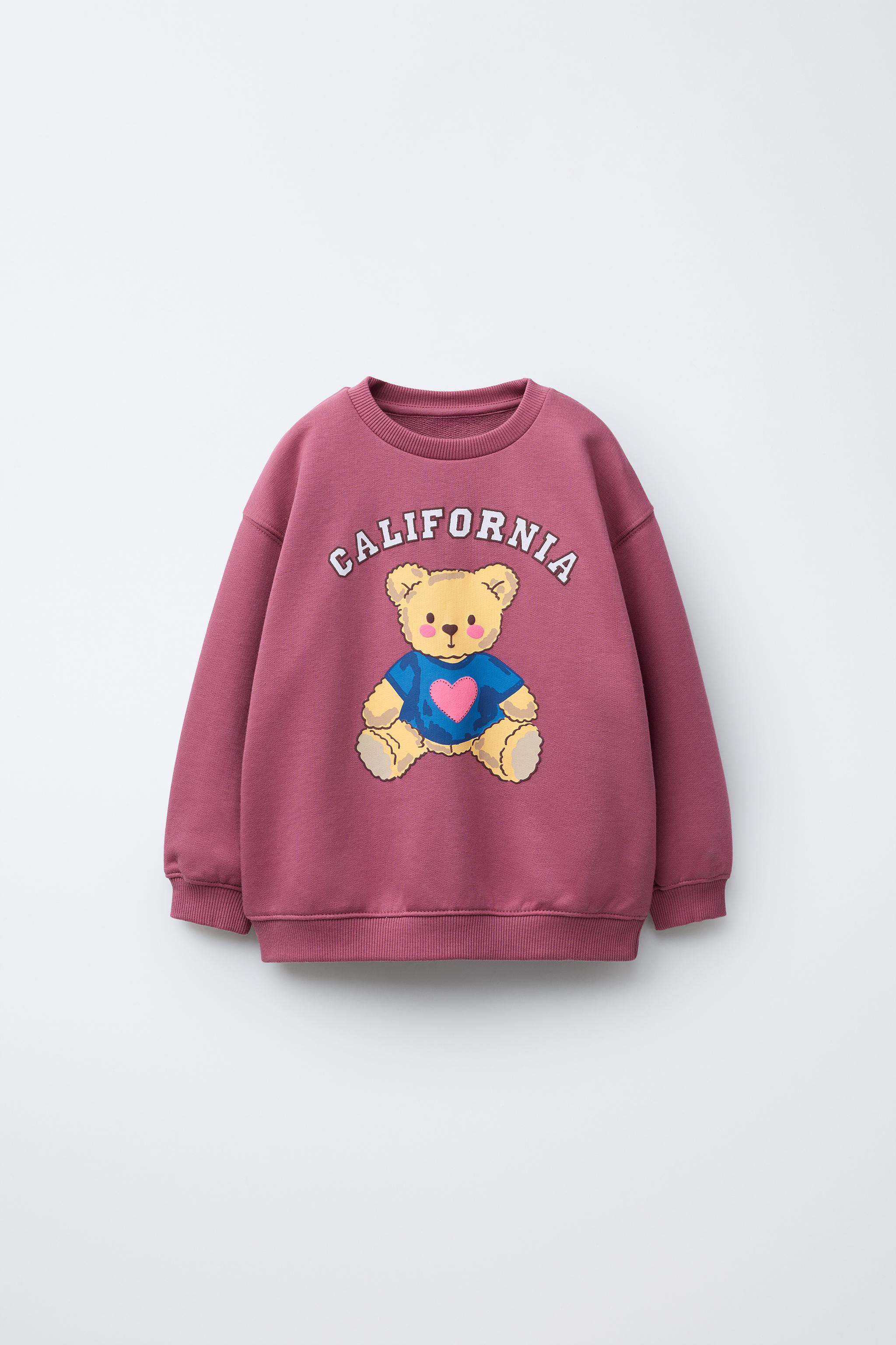 RAISED PRINT SWEATSHIRT