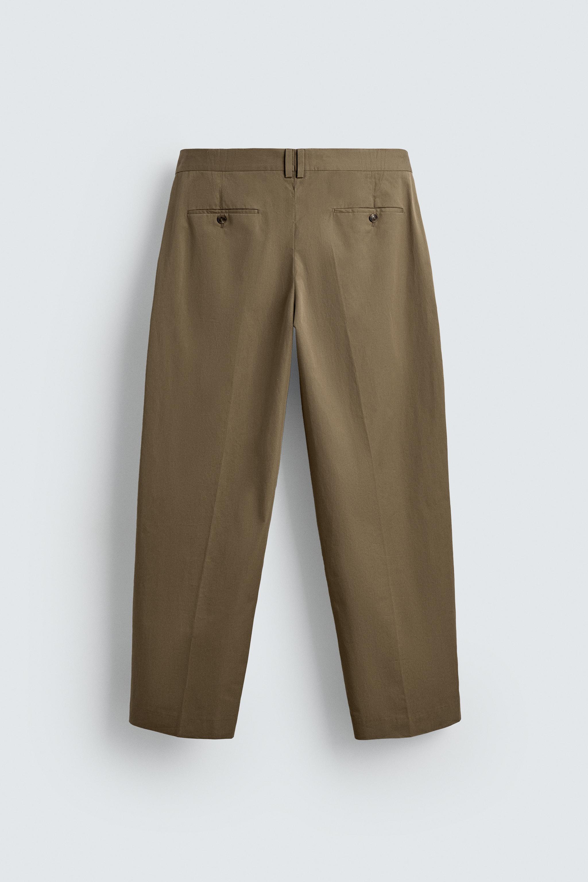 LIMITED EDITION RELAXED FIT PLEATED PANTS