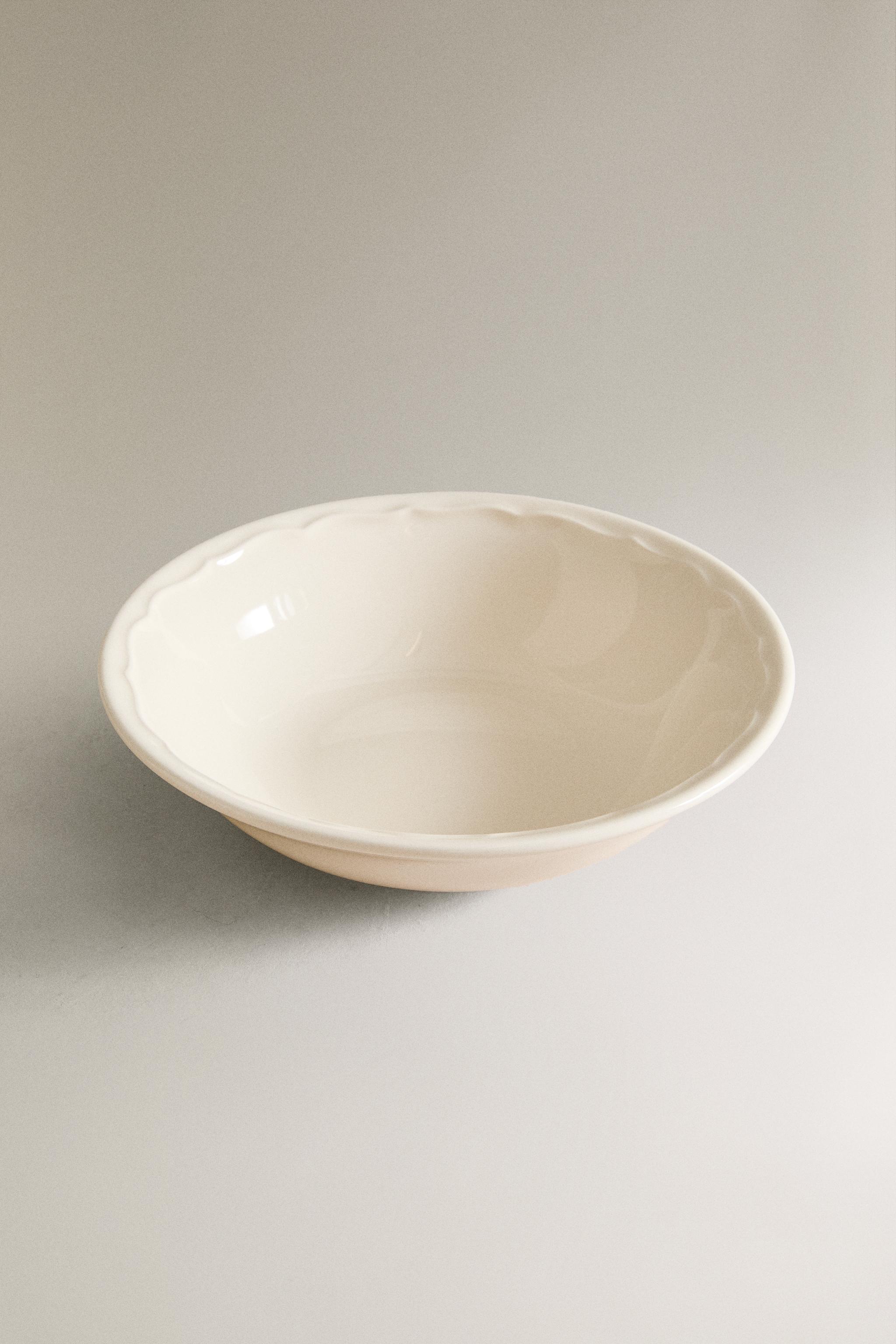 EARTHENWARE BOWL WITH RAISED-DESIGN EDGE
