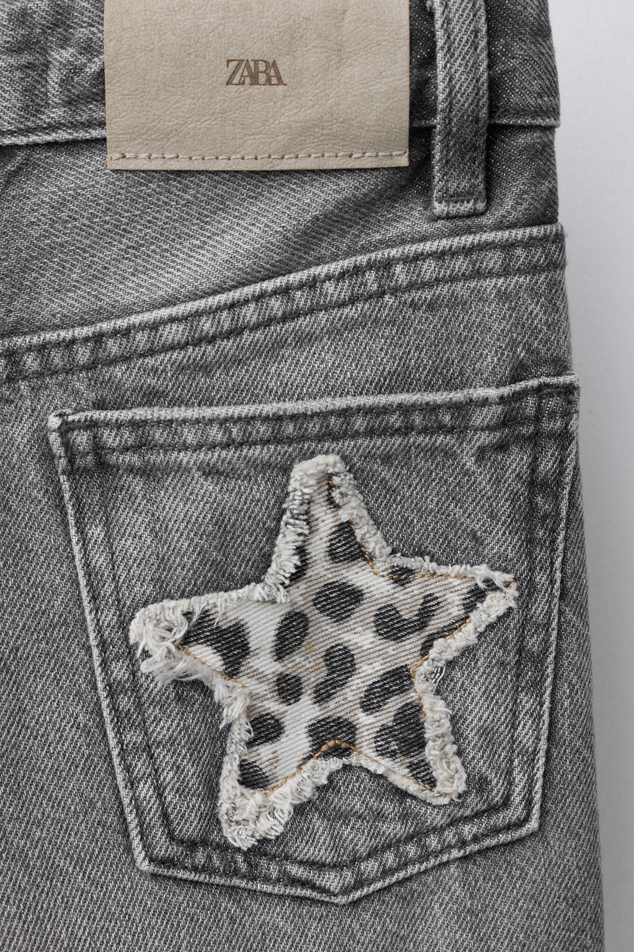 ANIMAL PRINT STAR WIDE LEG JEANS