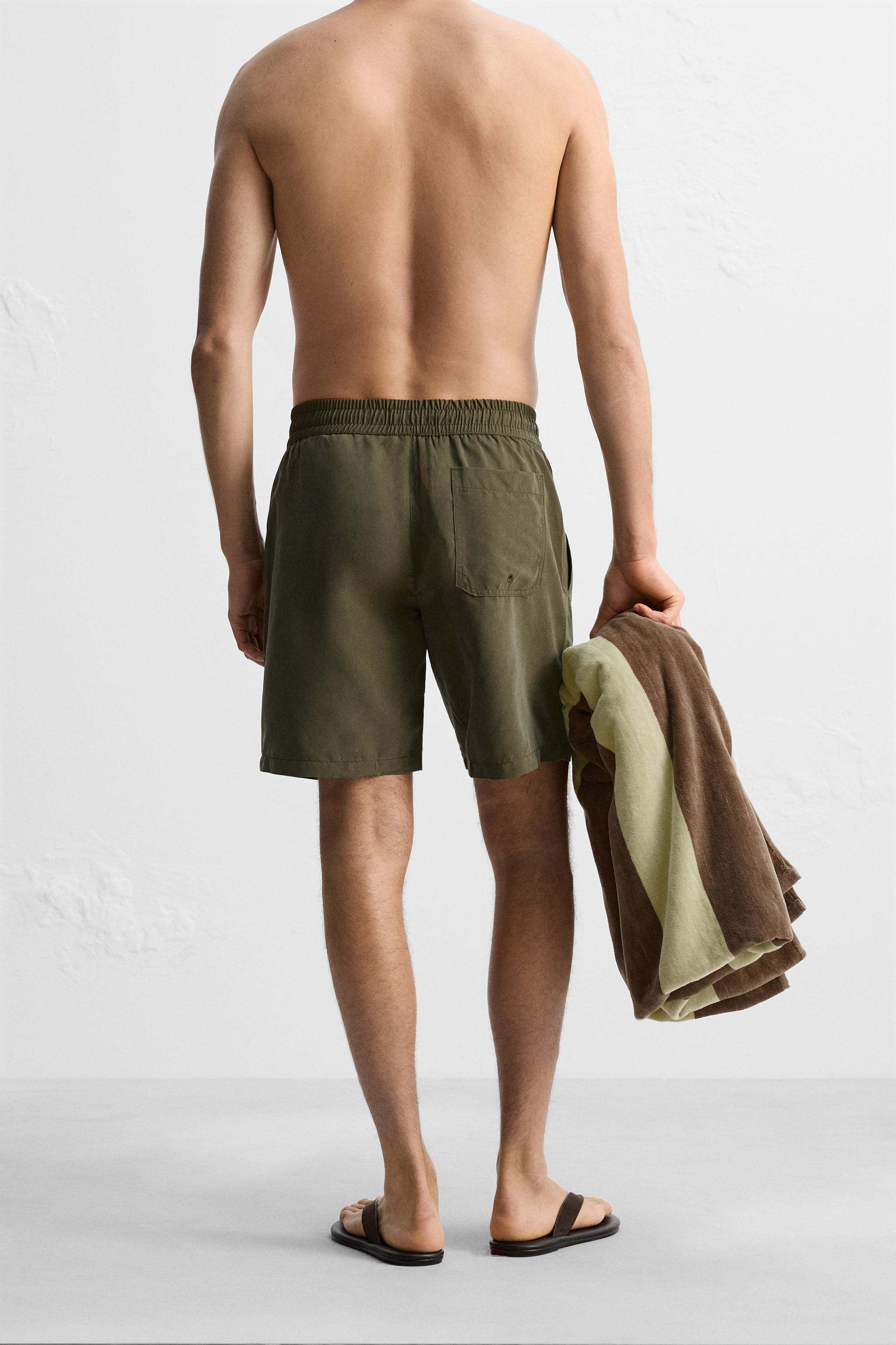 BASIC LONG SWIM TRUNKS