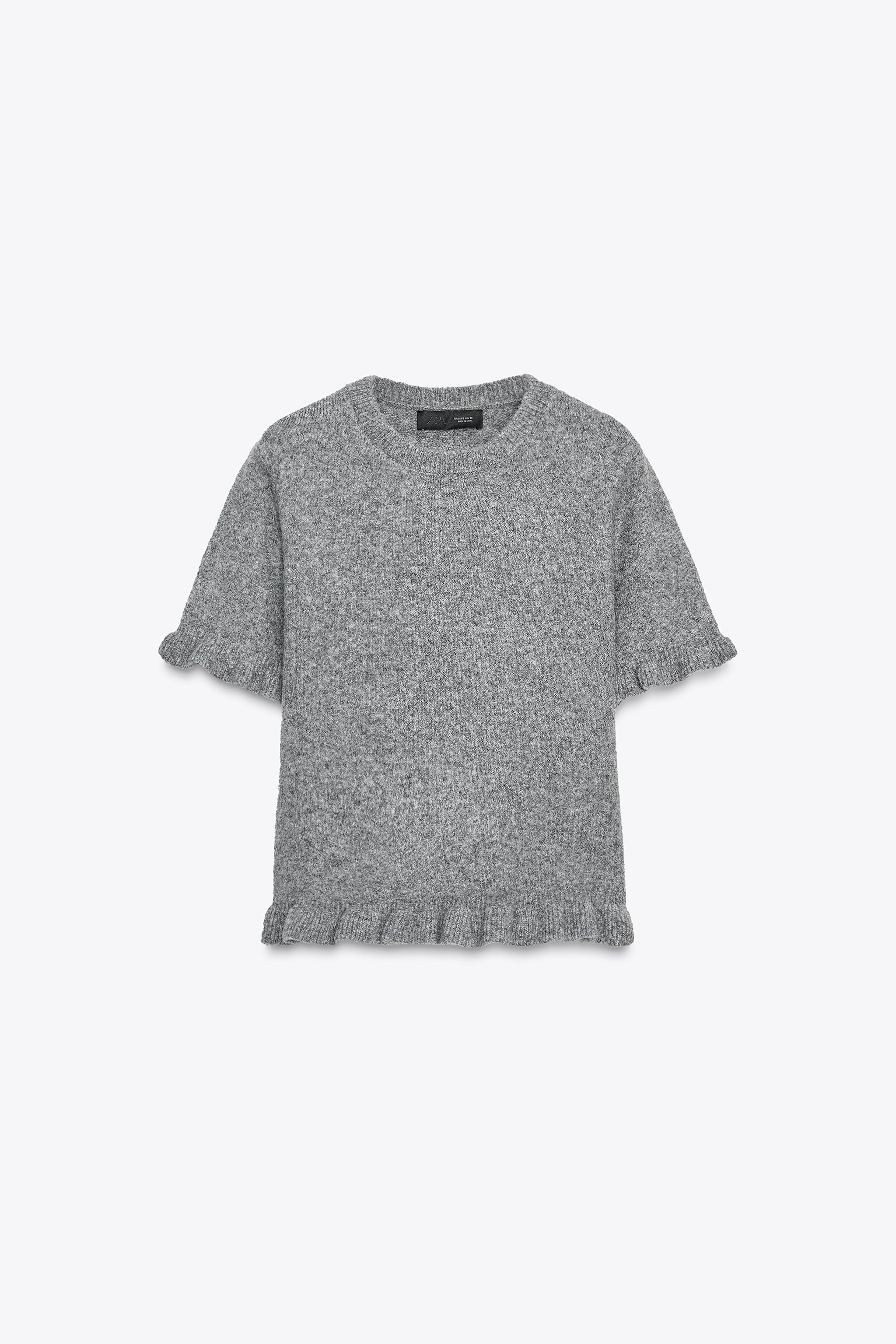 RUFFLED SHORT SLEEVE KNIT SWEATER