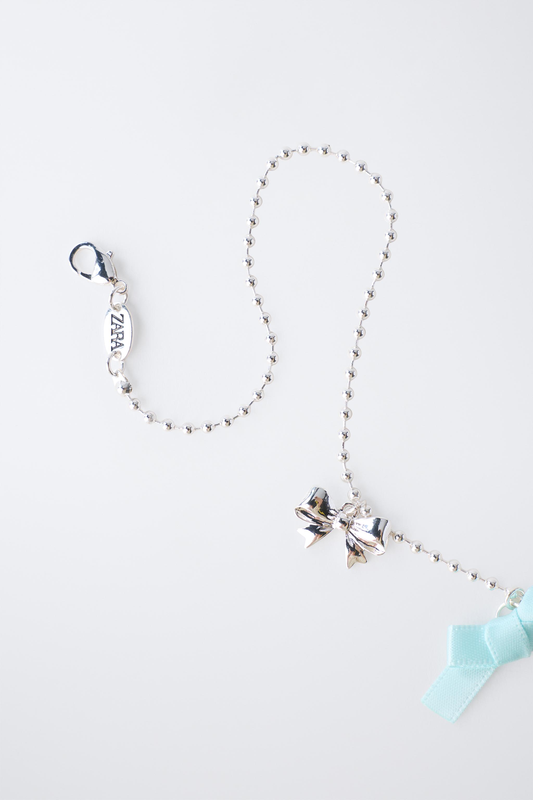 CHERRY AND BOW NECKLACE