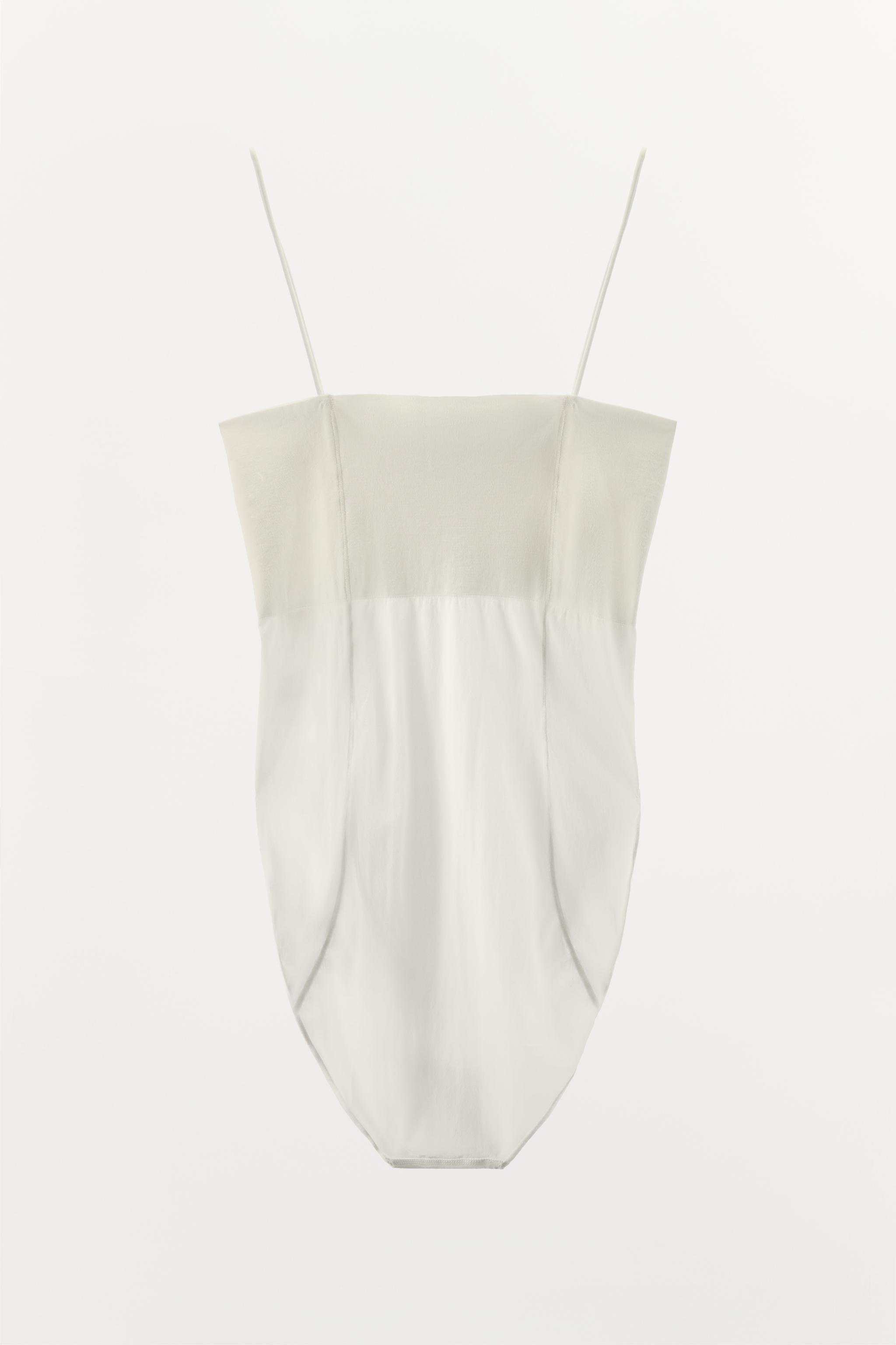 FITTED STRAPPY BODYSUIT WITH SEAMS