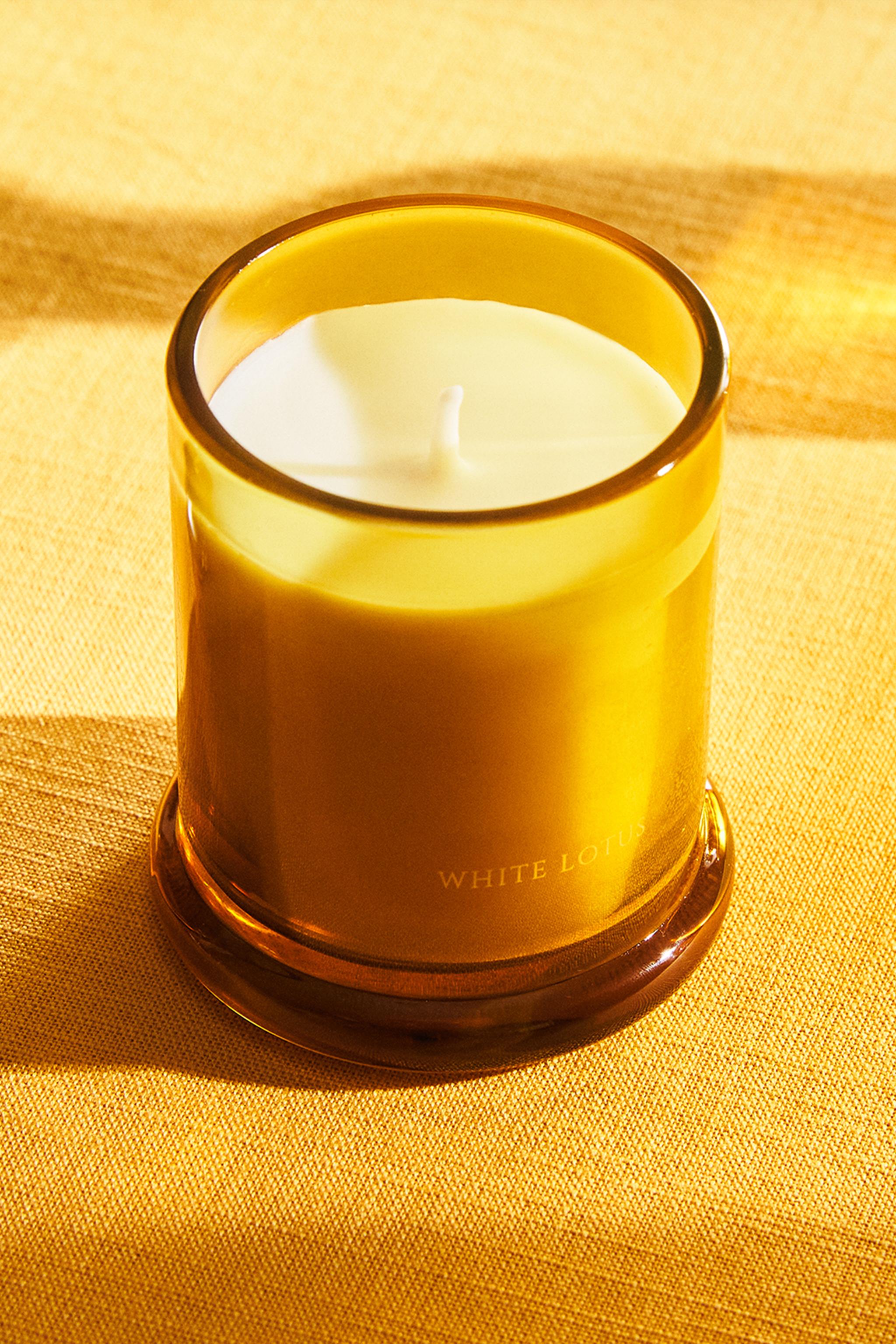 (150 G) WHITE LOTUS SCENTED CANDLE