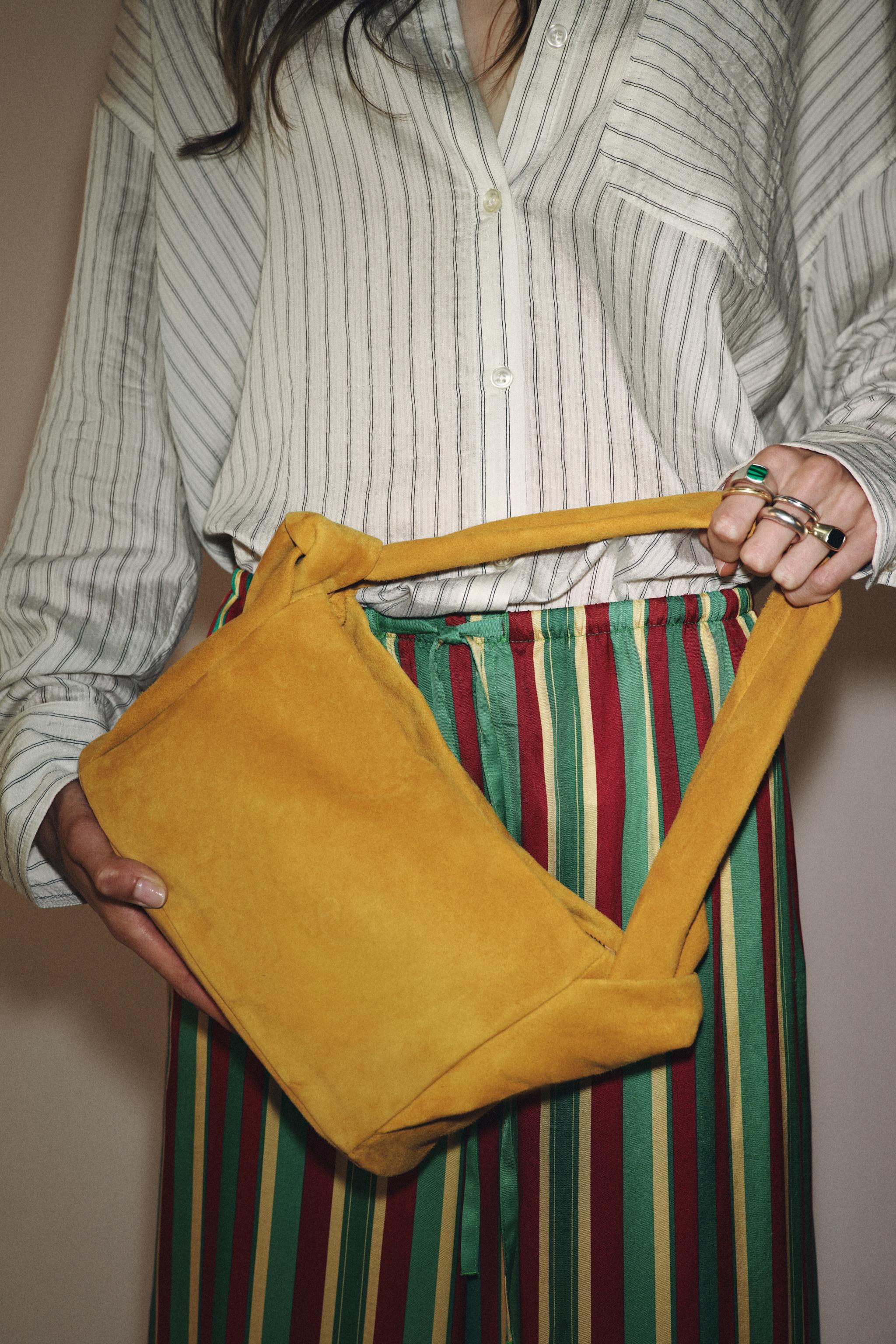 SPLIT LEATHER HANDBAG