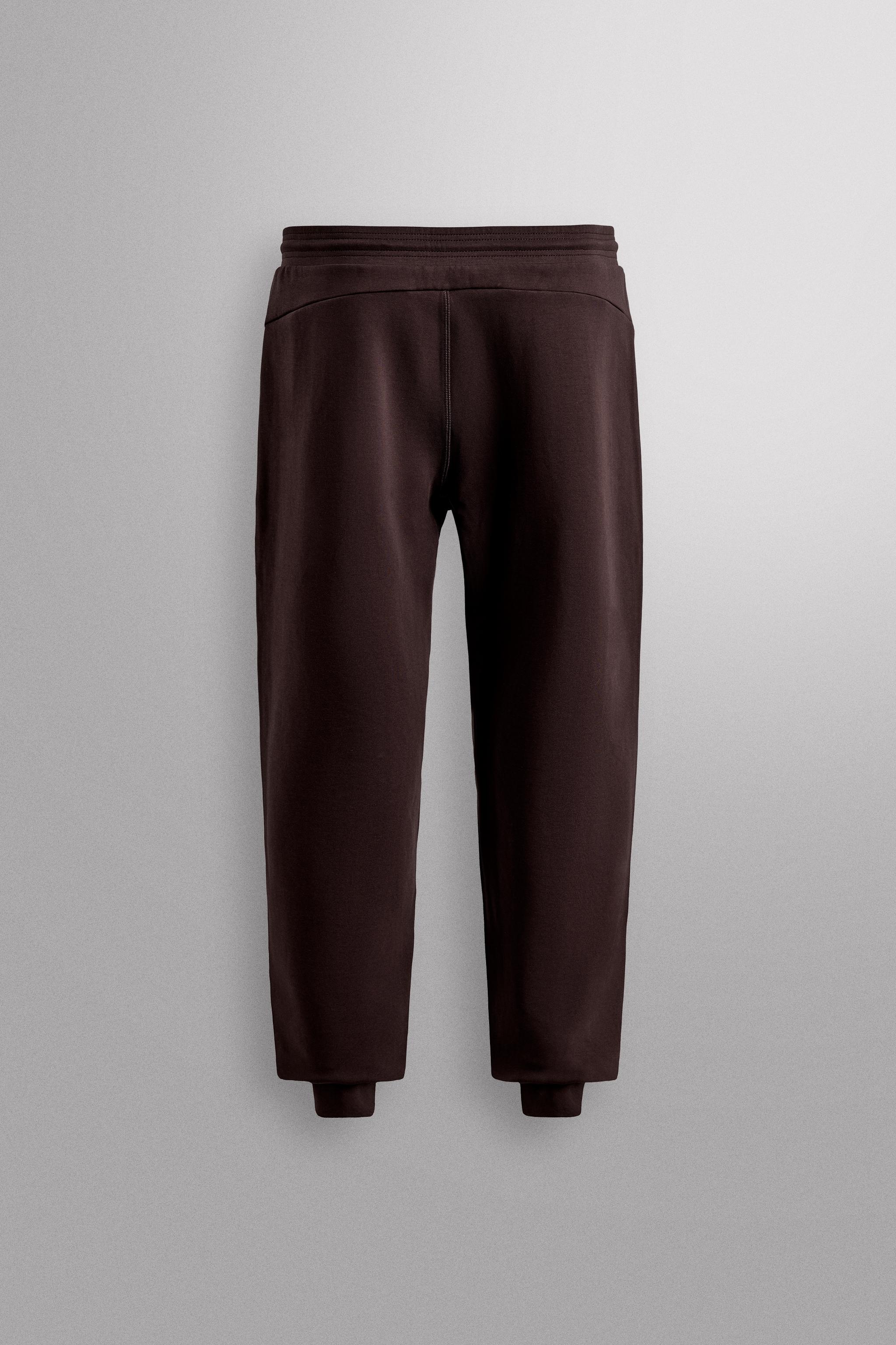 TECHNICAL ZIPPER PANTS