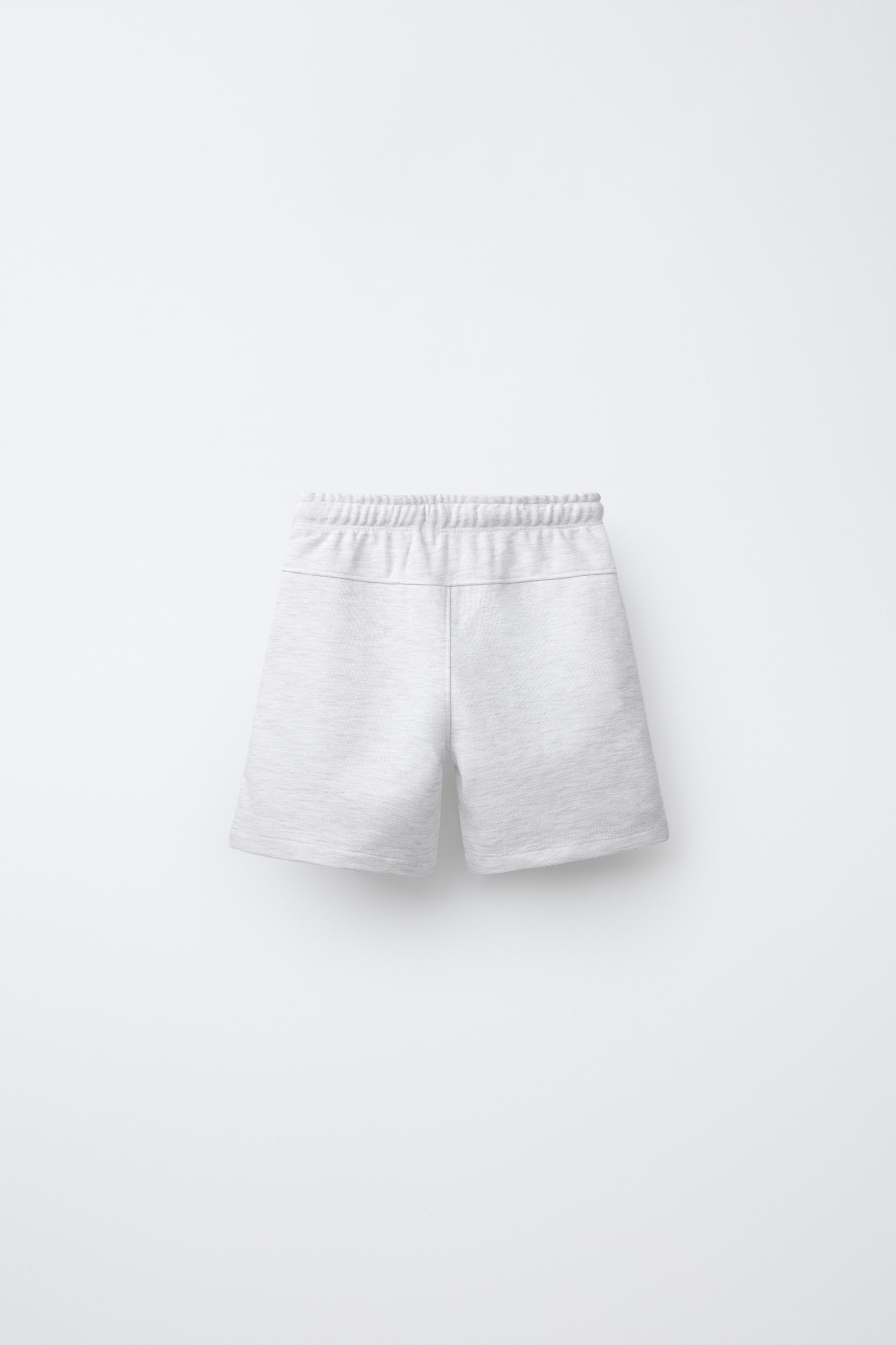 STRAIGHT FIT EMBOSSED TEXT TERRY SHORTS
