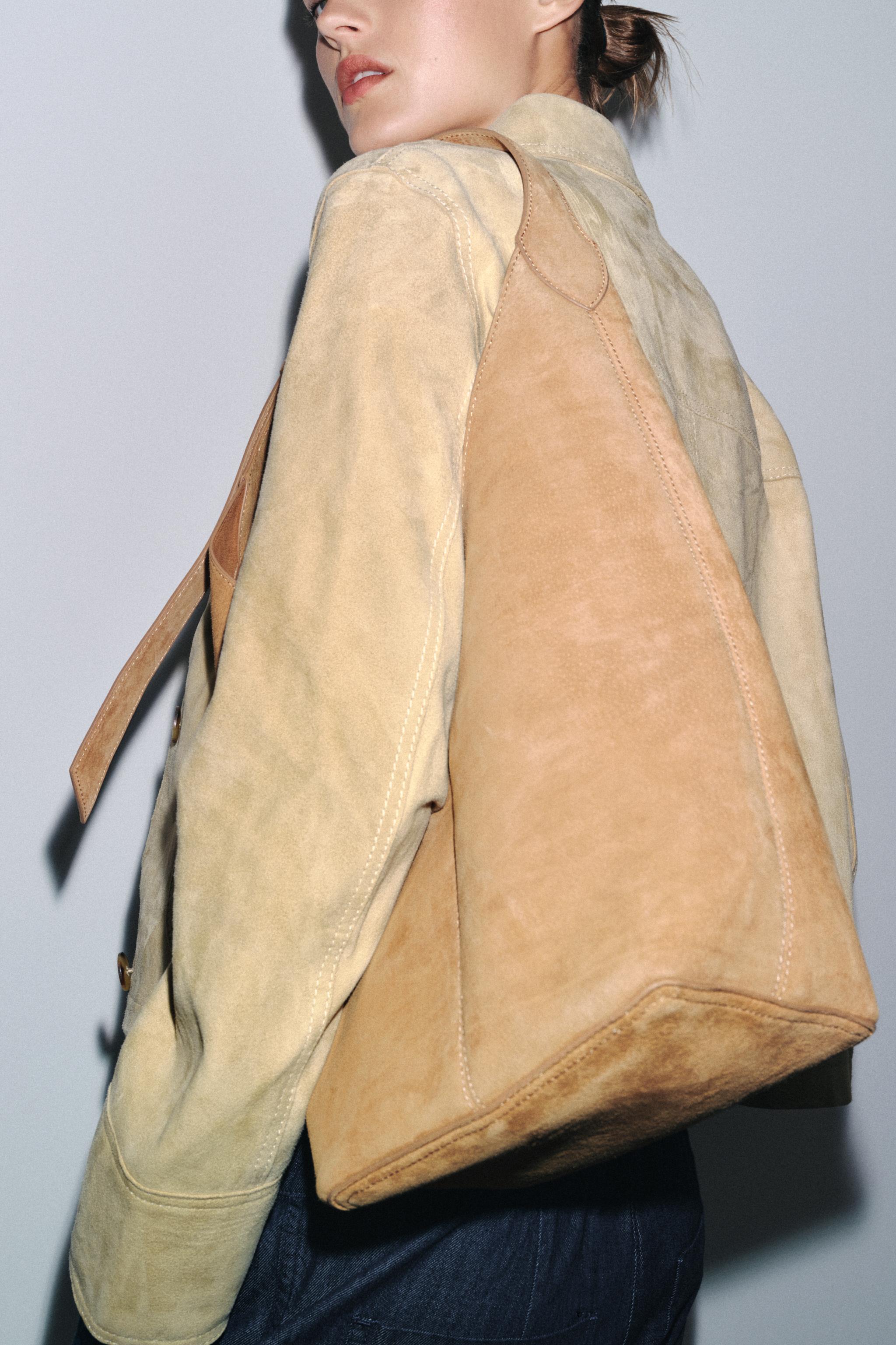 LEATHER MAXI BUCKET BAG WITH HANDLE DETAIL