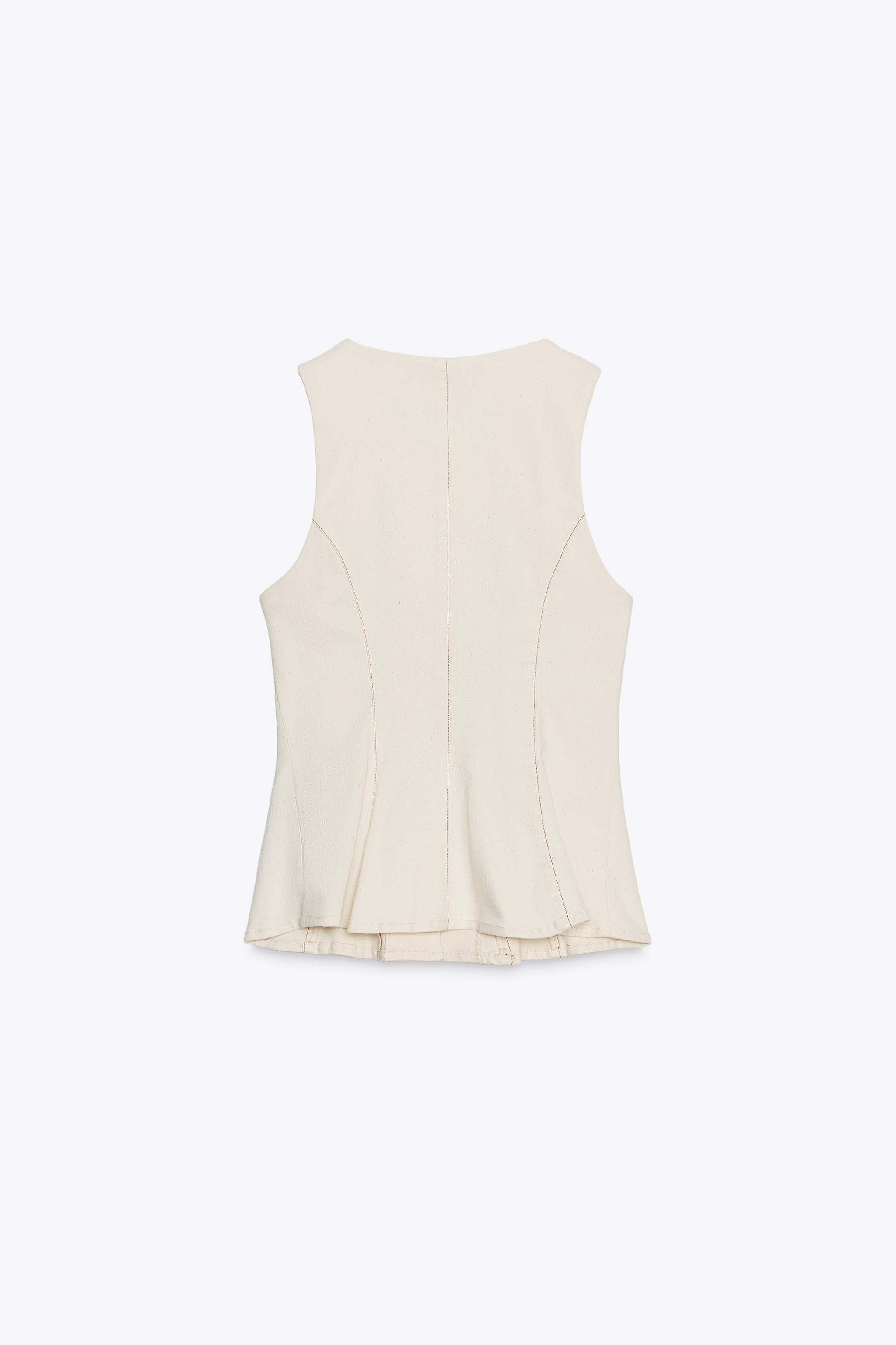 STITCHED PEPLUM VEST
