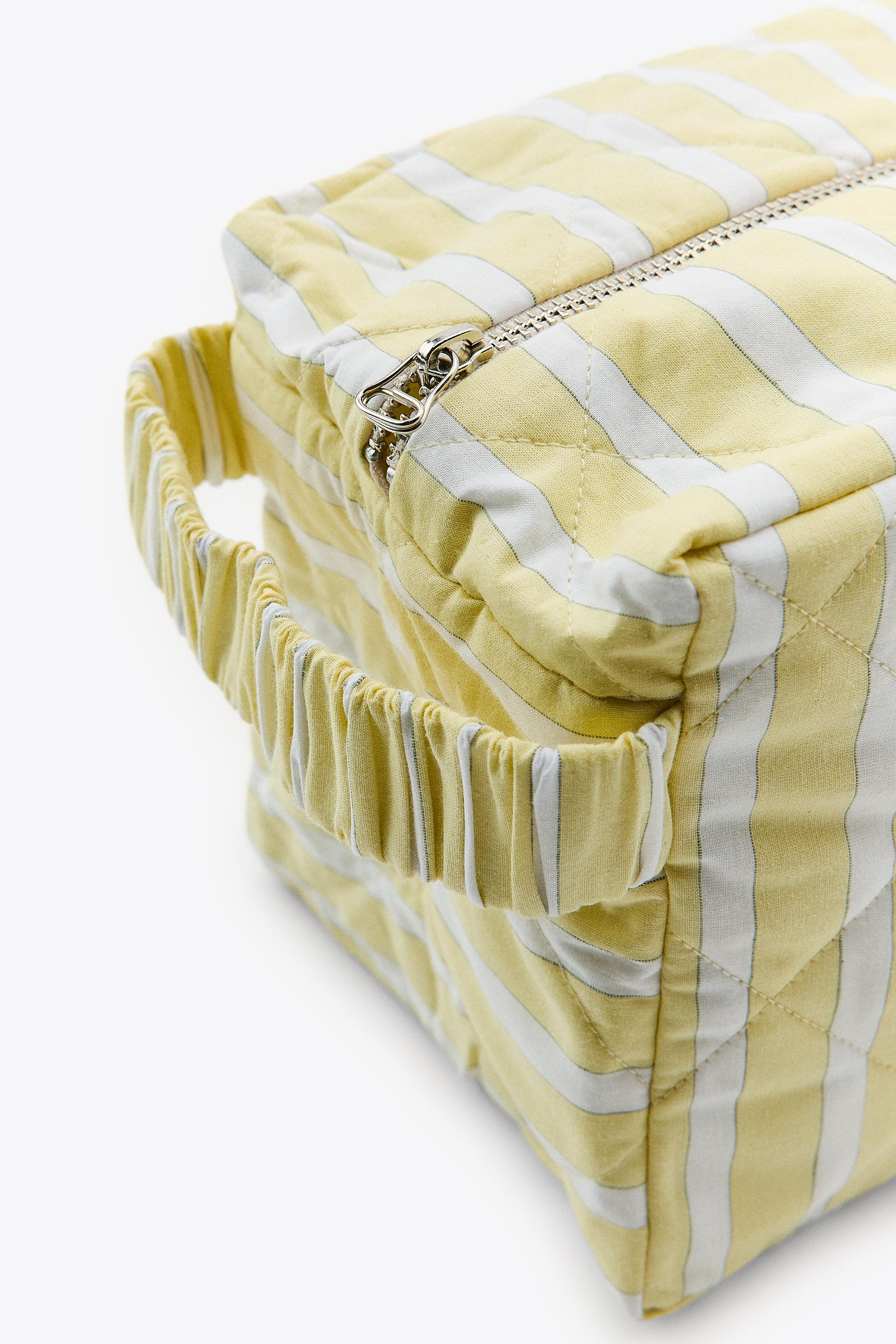 STRIPED TOILETRY BAG