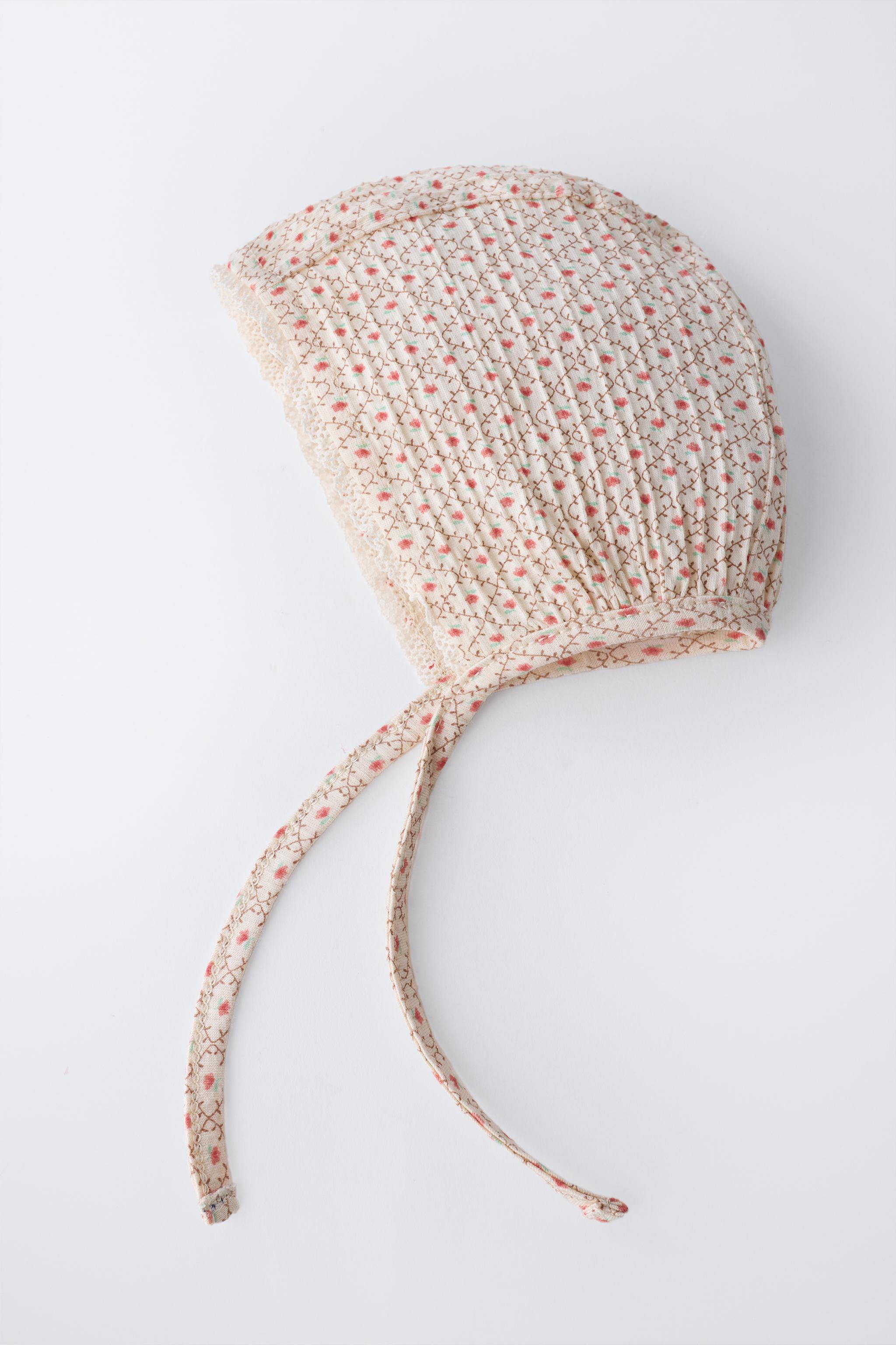 COTTON GAUZE BONNET WITH FLORAL AND LACE DETAIL