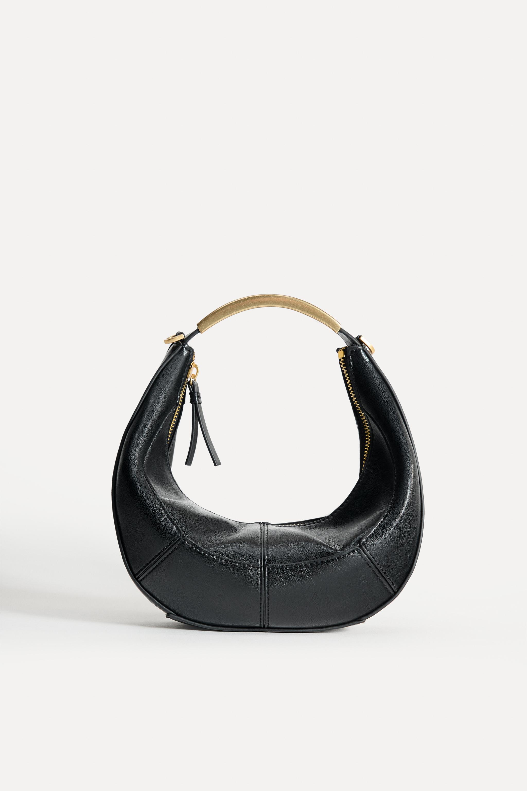 OVAL BAG WITH METAL HANDLE