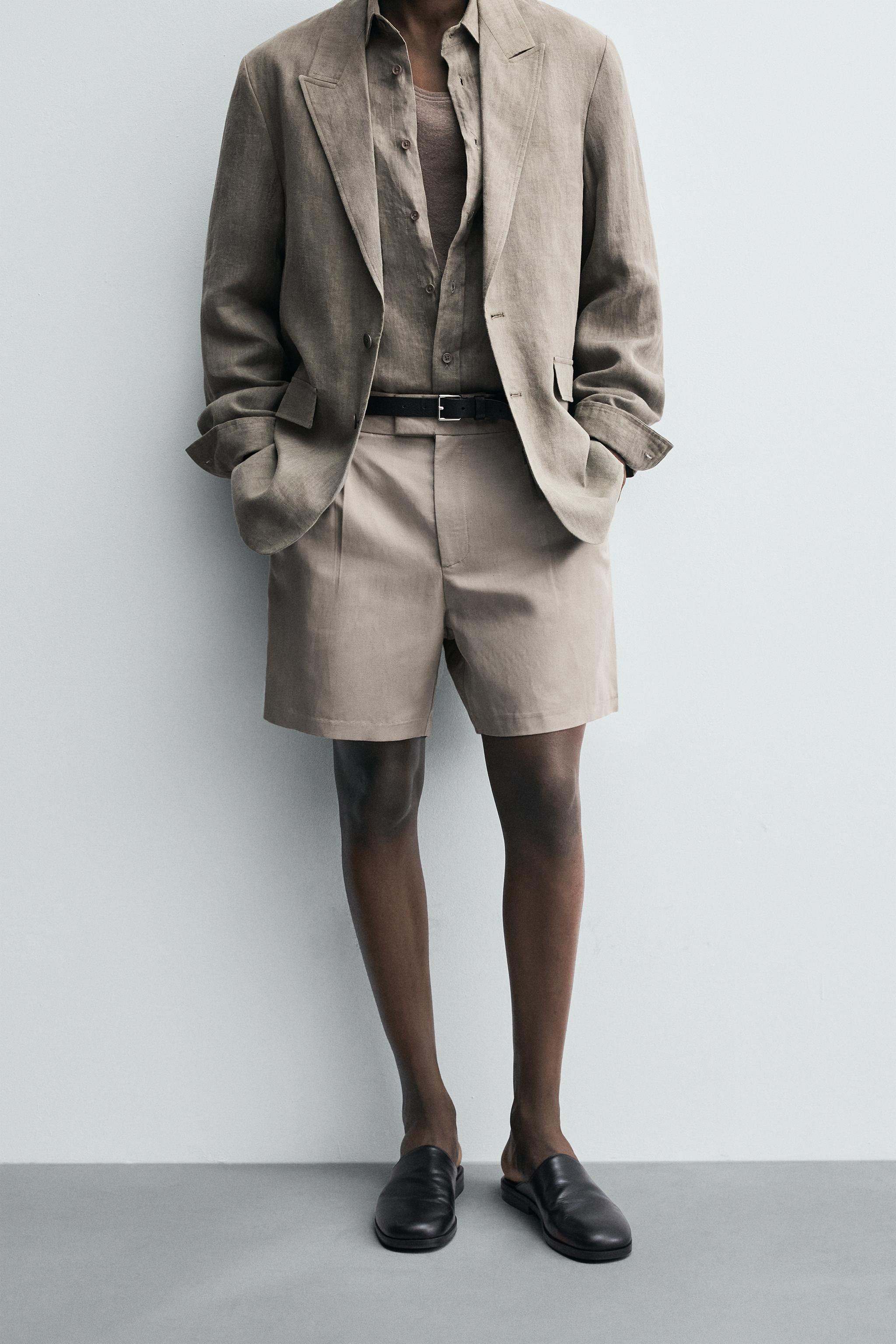 RELAXED FIT PLEATED SHORTS