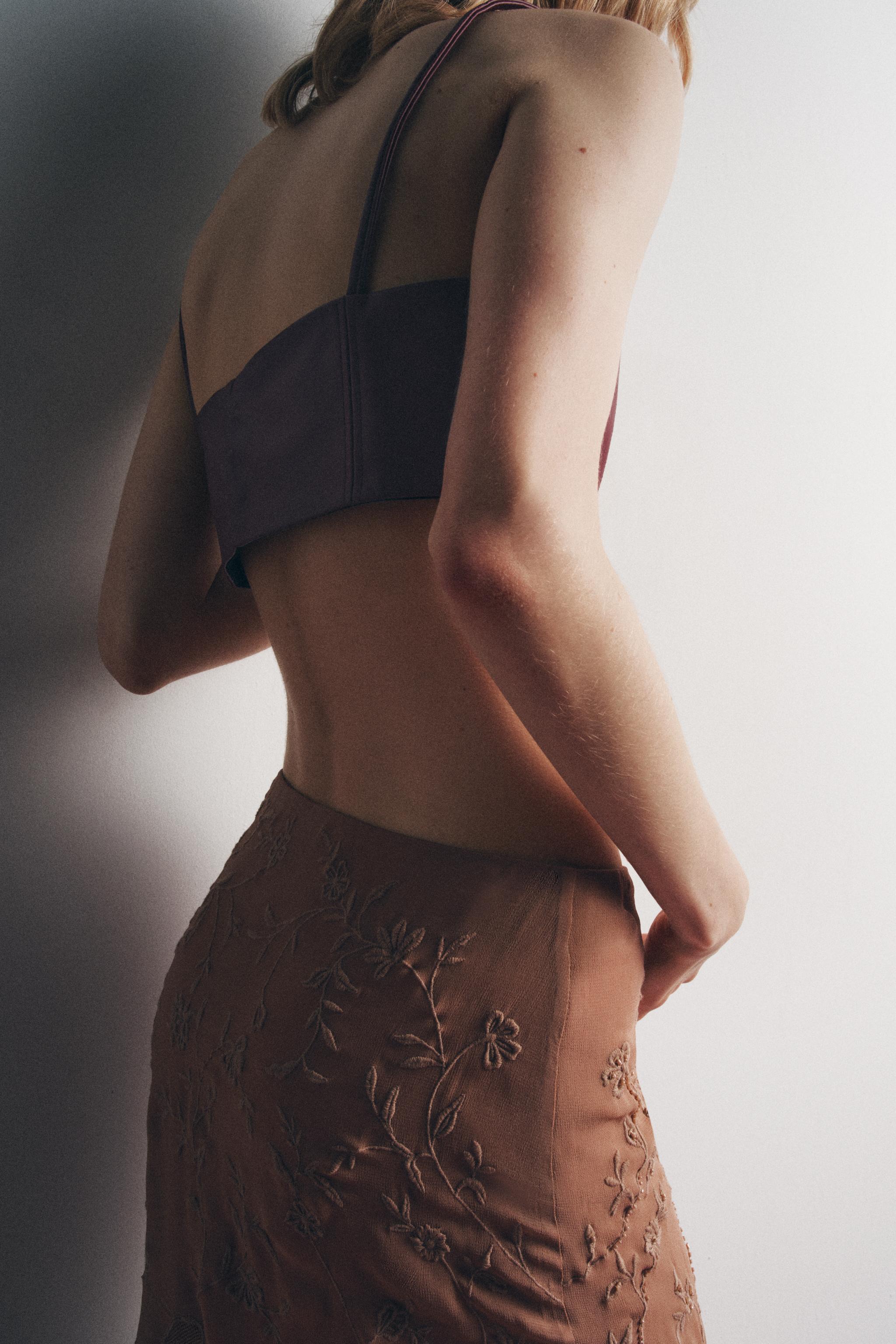 FAUX LEATHER STRAPPY BRALETTE