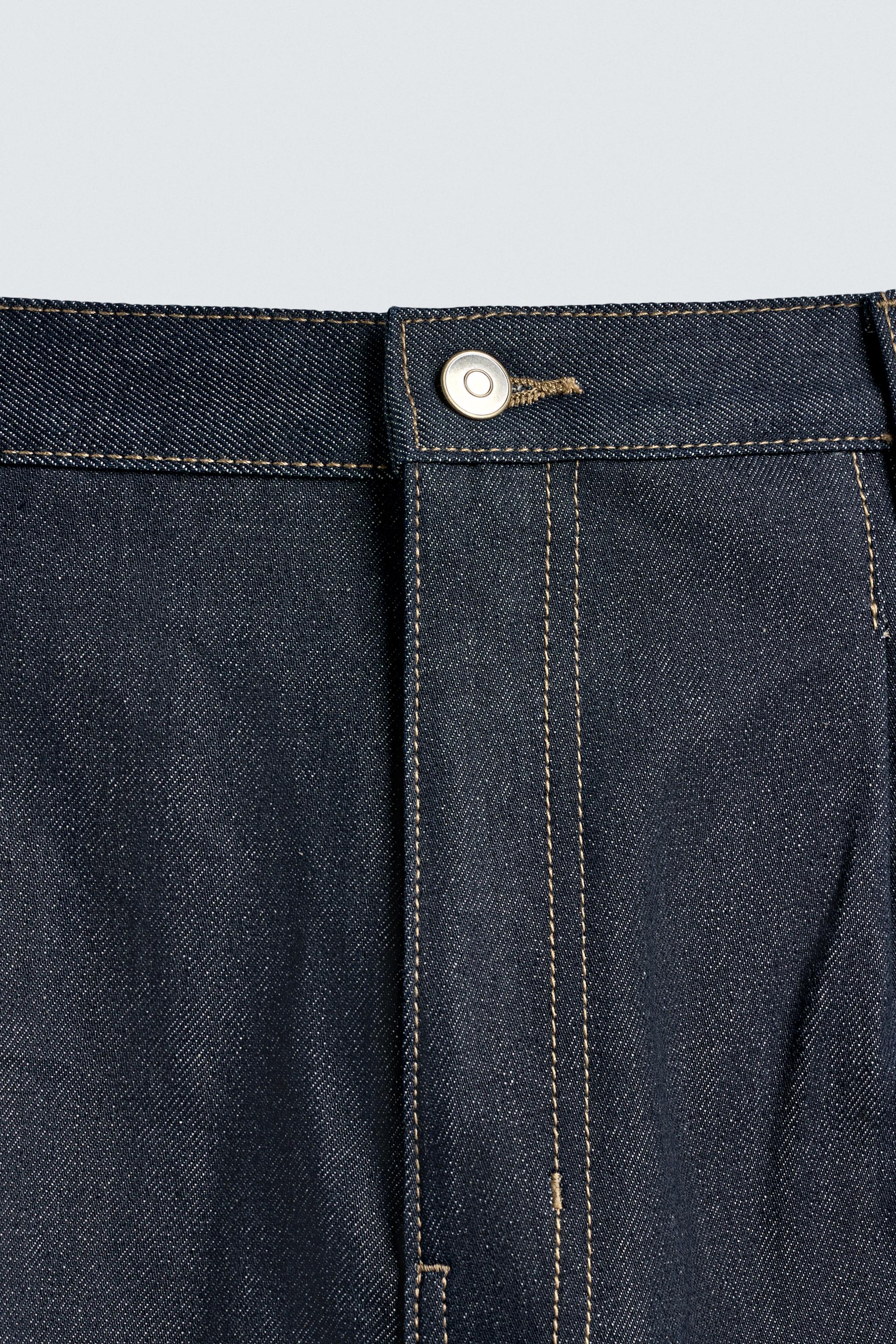 RELAXED FIT PLEATED DENIM SHORTS