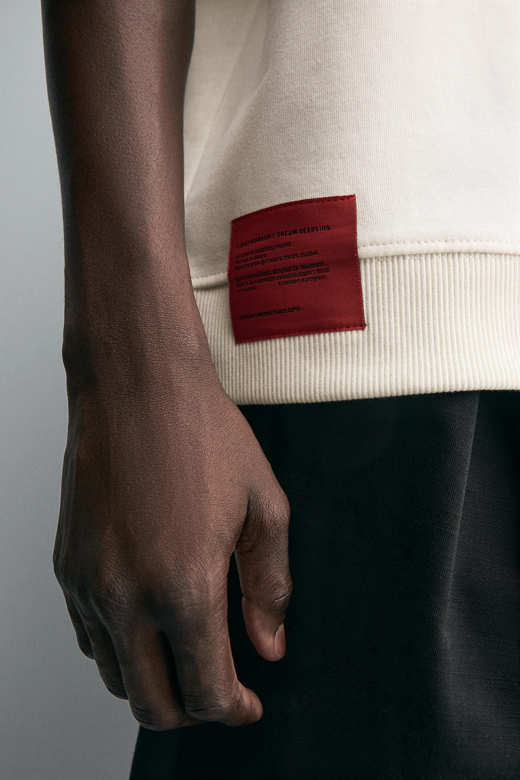 INTERLOCK TECHNICAL LABEL SWEATSHIRT