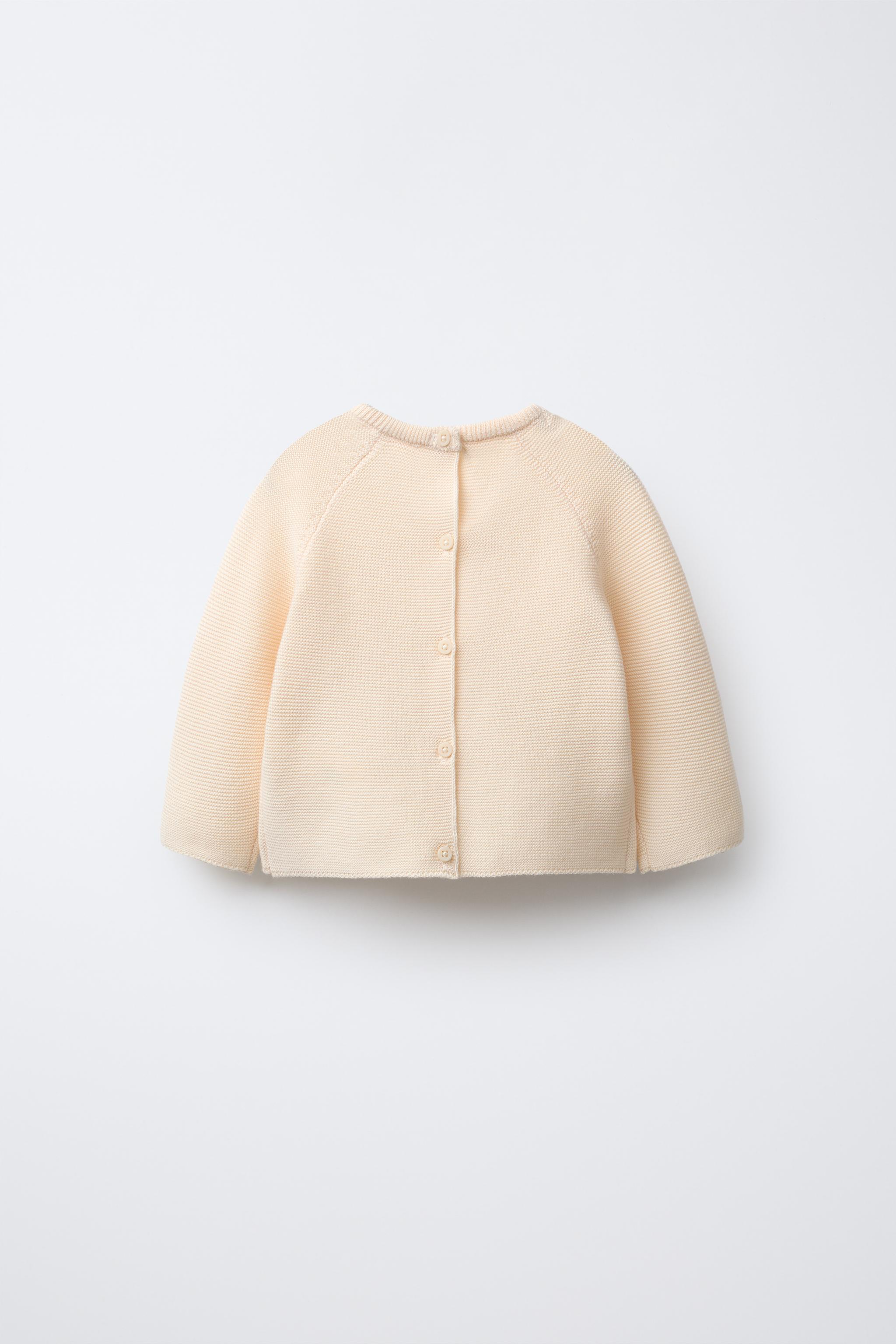 EMBROIDERED ELEPHANT KNIT SWEATER