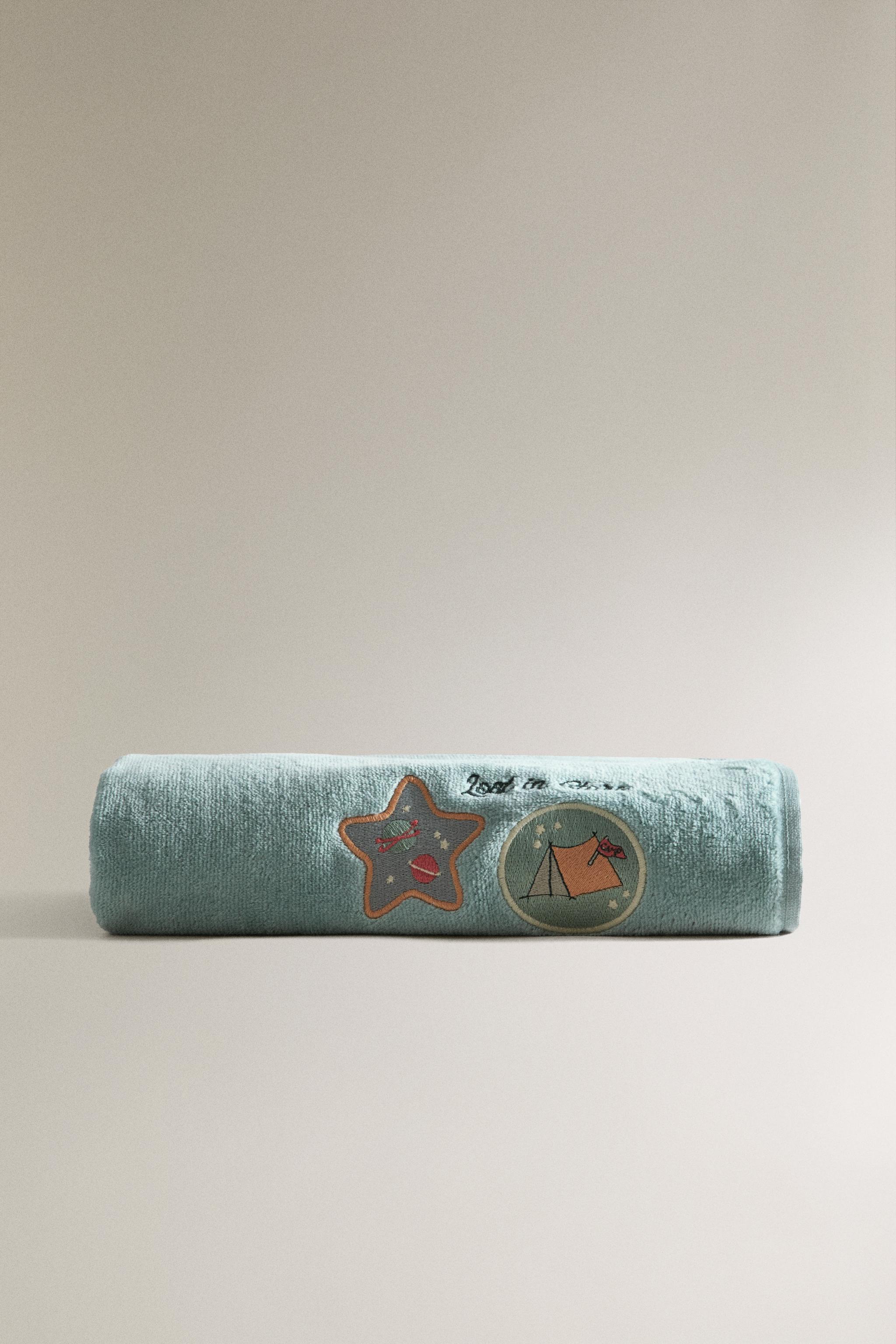 CHILDREN'S VELOUR TOWEL WITH SPACE PATCHES