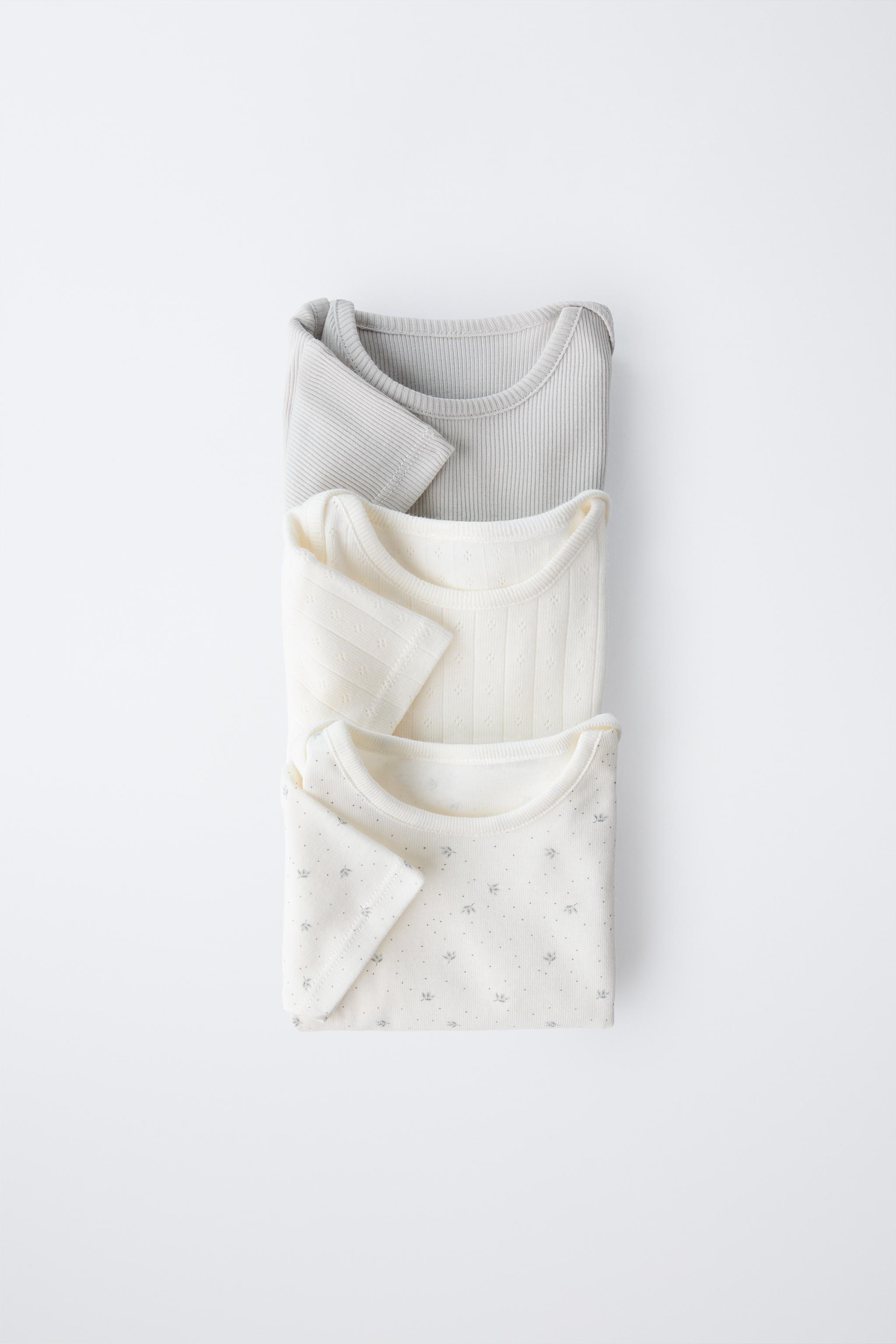 THREE-PACK OF SHORT SLEEVE BODYSUITS WITH TWIGS