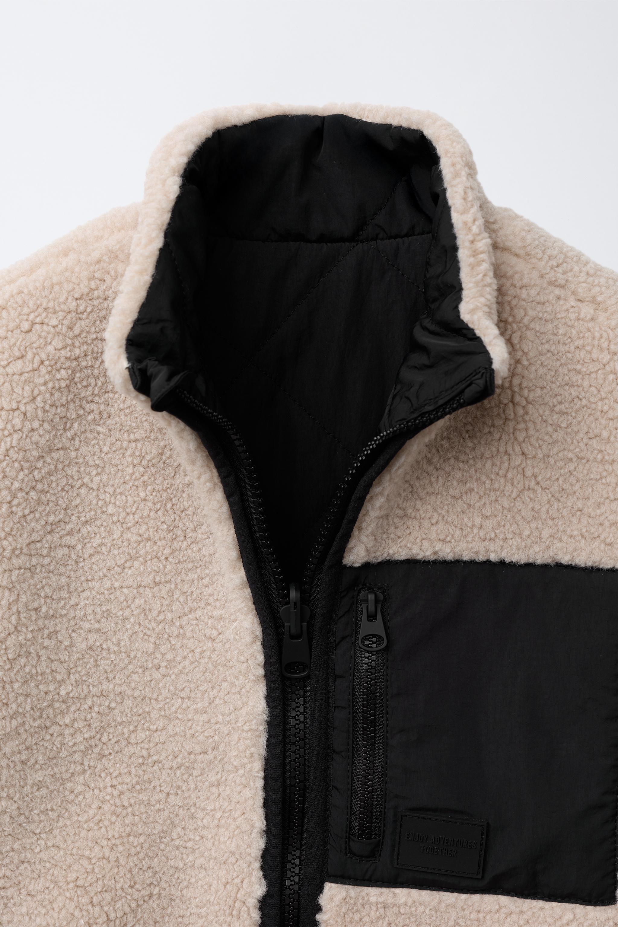 REVERSIBLE FLEECE VEST