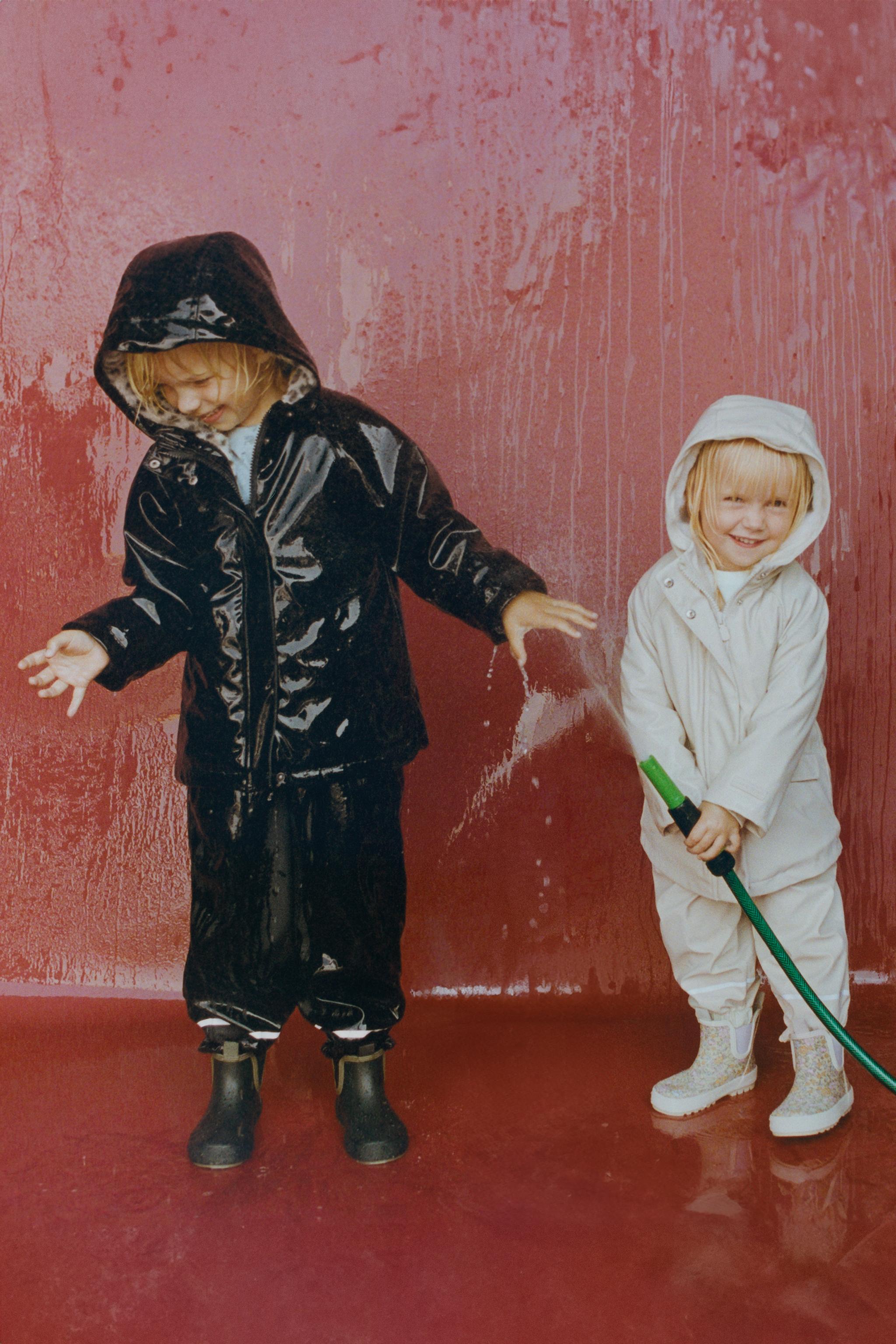 WATER REPELLENT COATED FAUX FUR JACKET