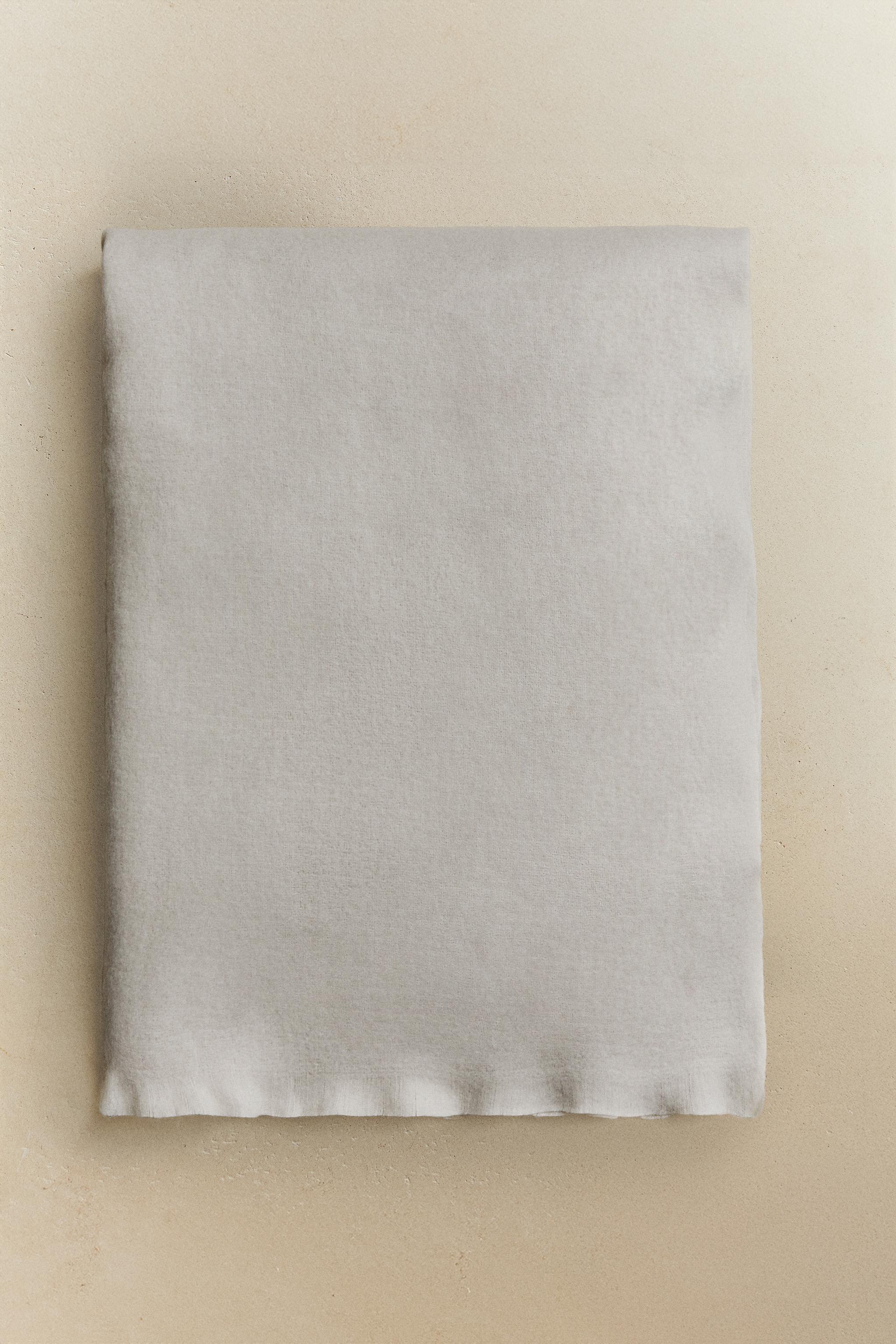 FRINGED SOFT BLANKET