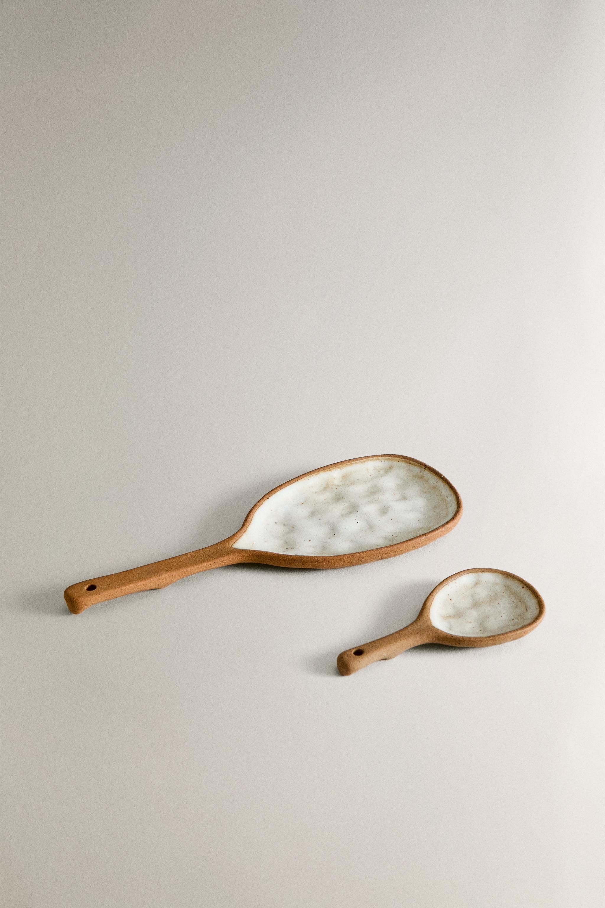 SPOON WITH RAISED DESIGN