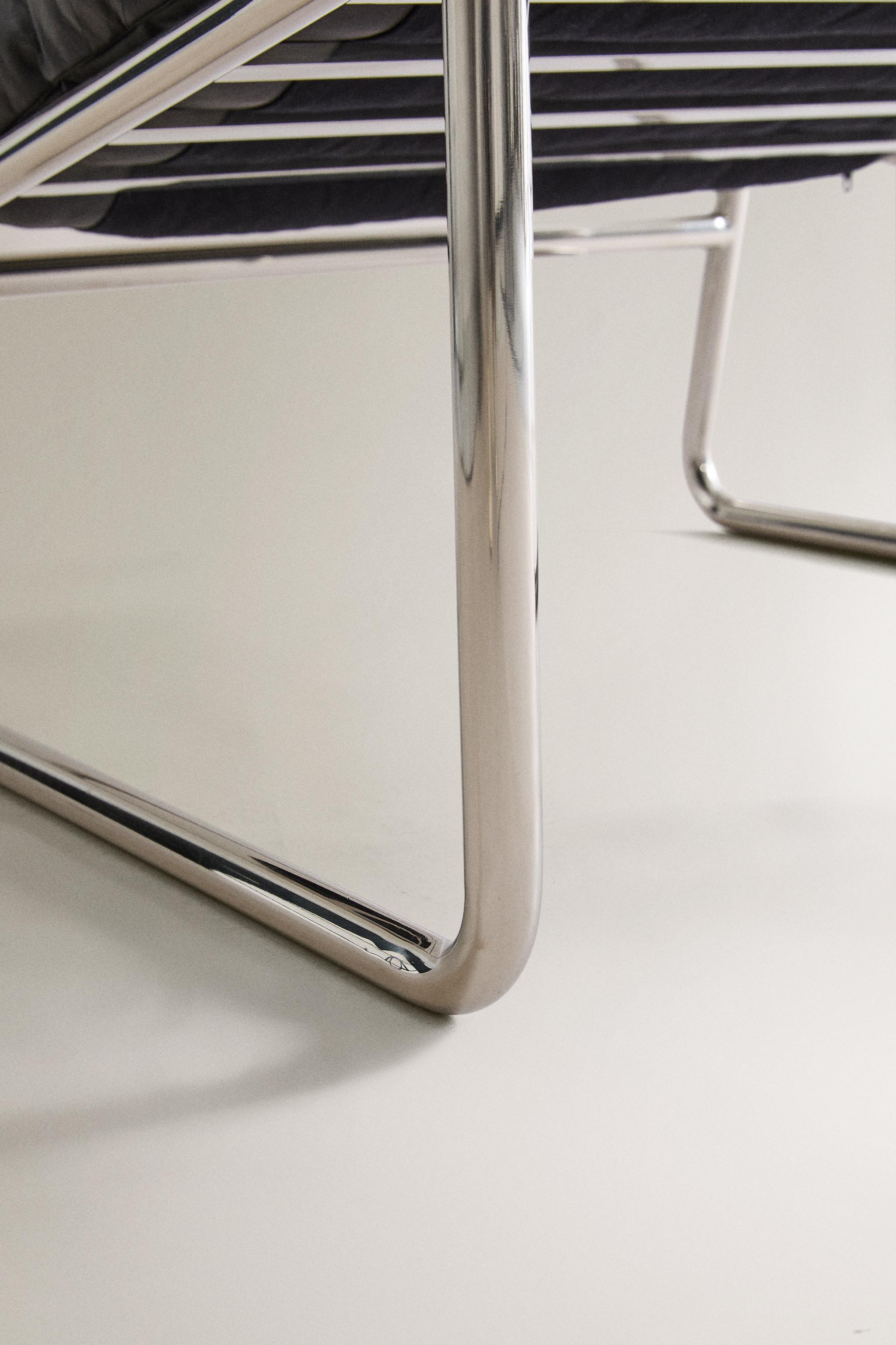 METAL AND LEATHER ACCENT CHAIR