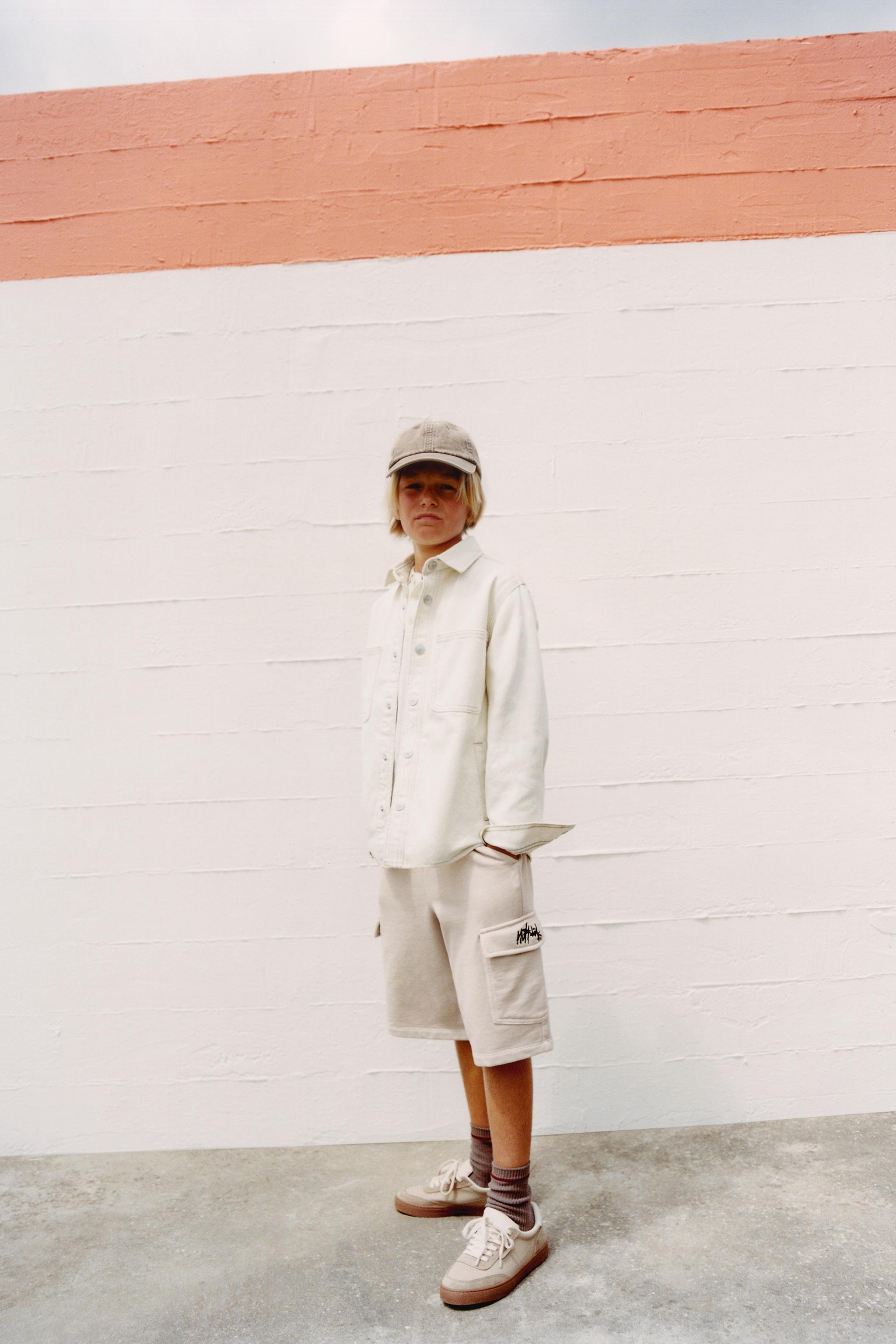 STRAIGHT FIT GRAFFITI CARGO PLUSH SHORTS