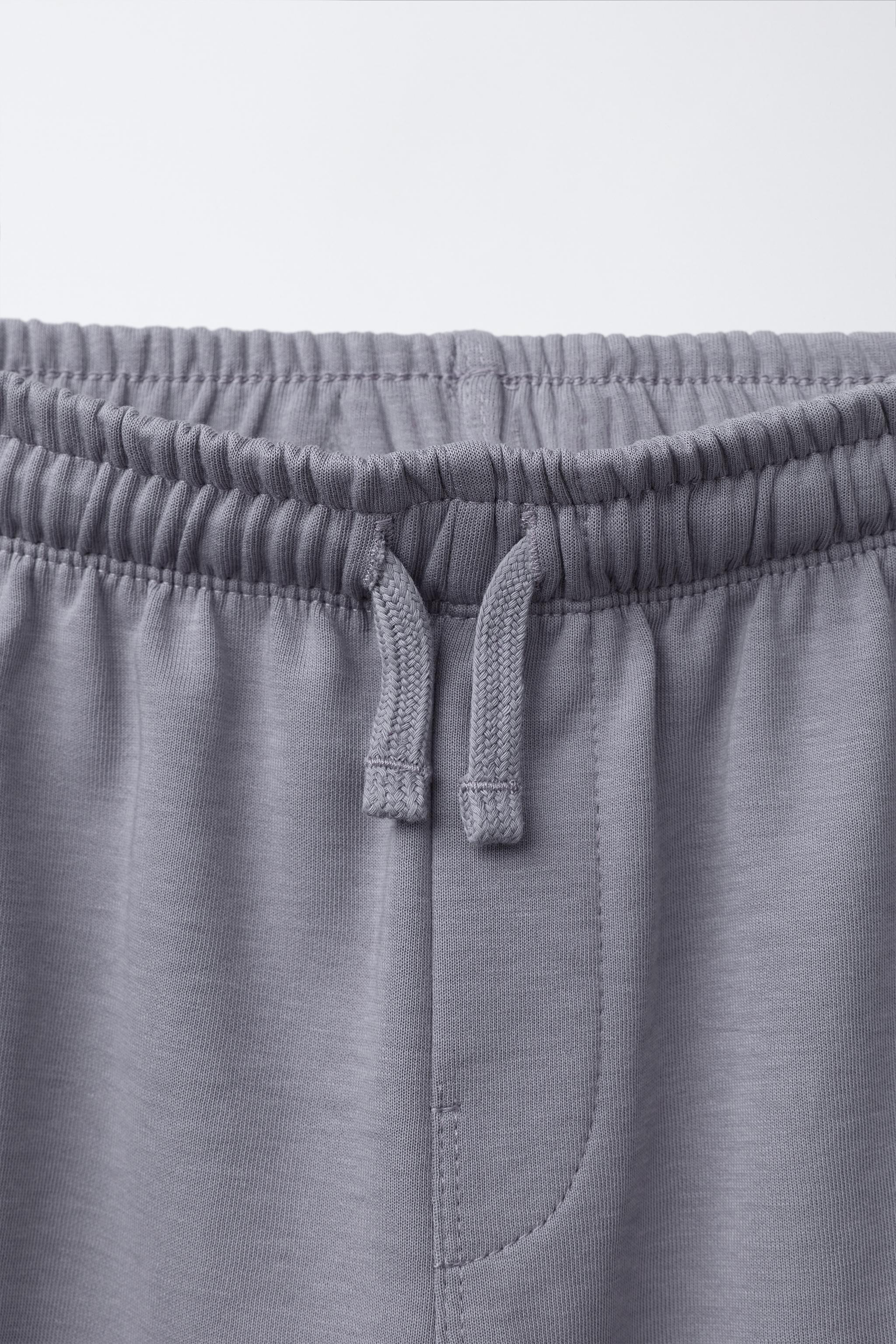 TEXT INTERLOCK T-SHIRT AND BERMUDA SET