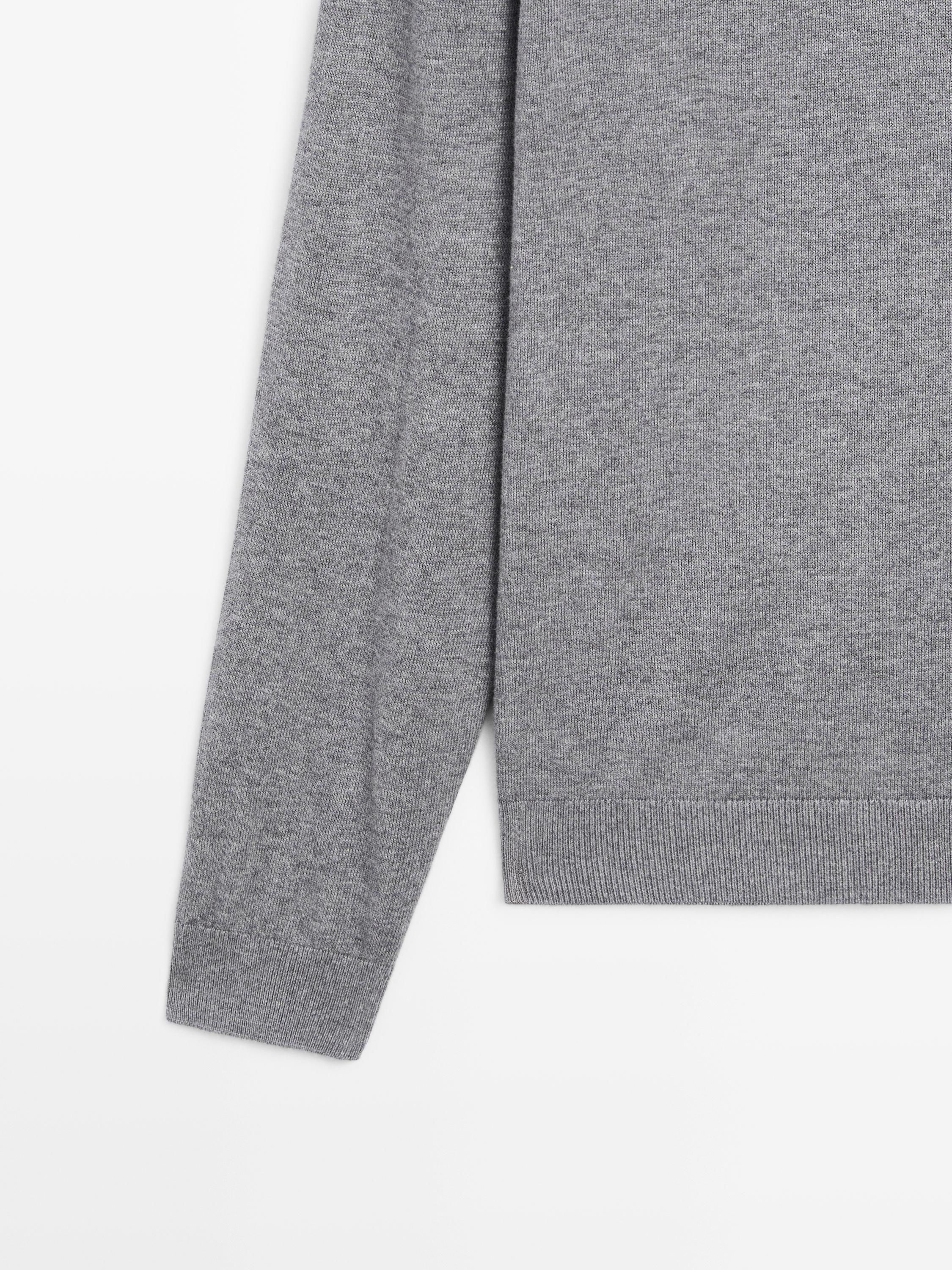 Knit sweater with mock button neck