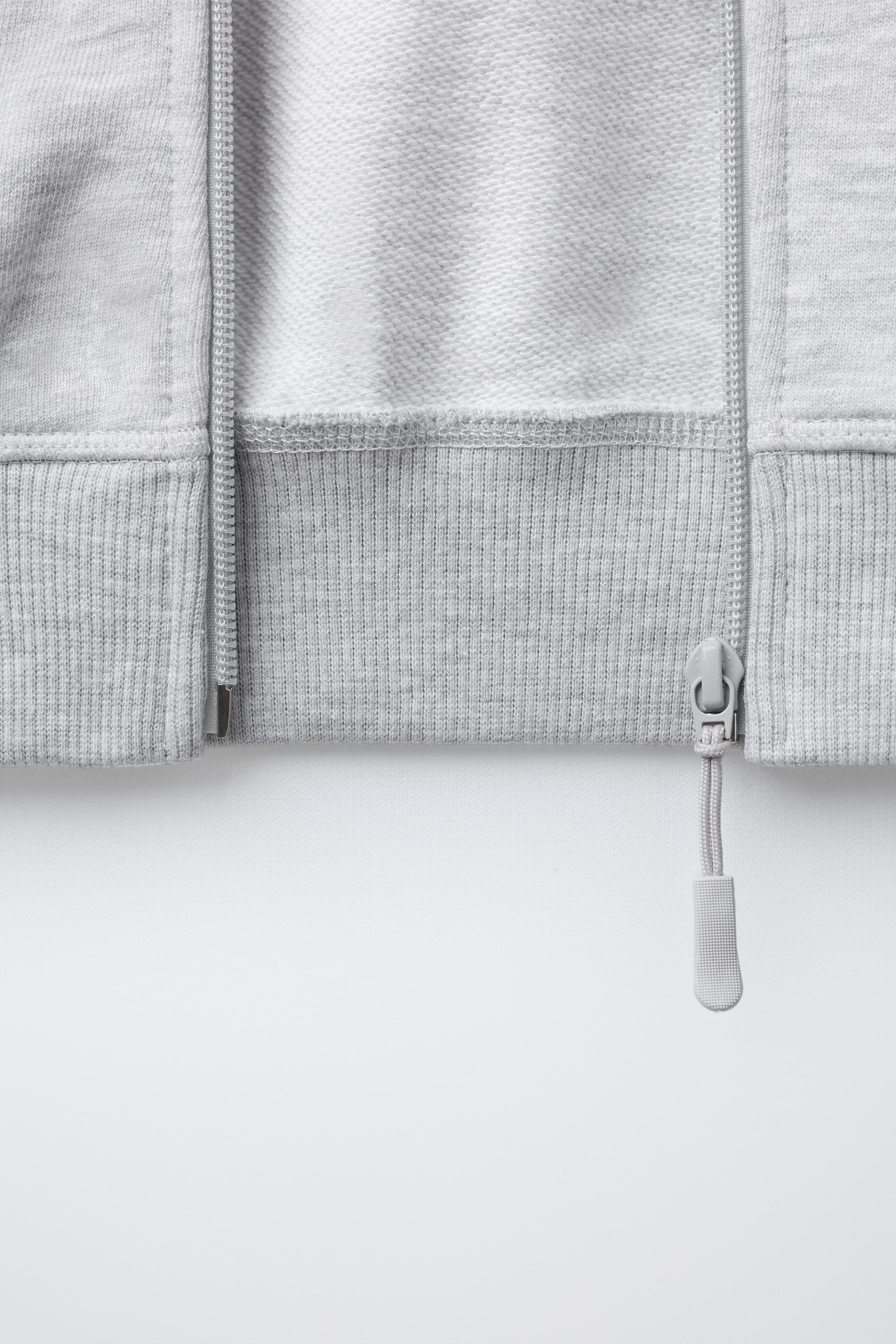 EMBROIDERED TEXT HOODED SWEATSHIRT