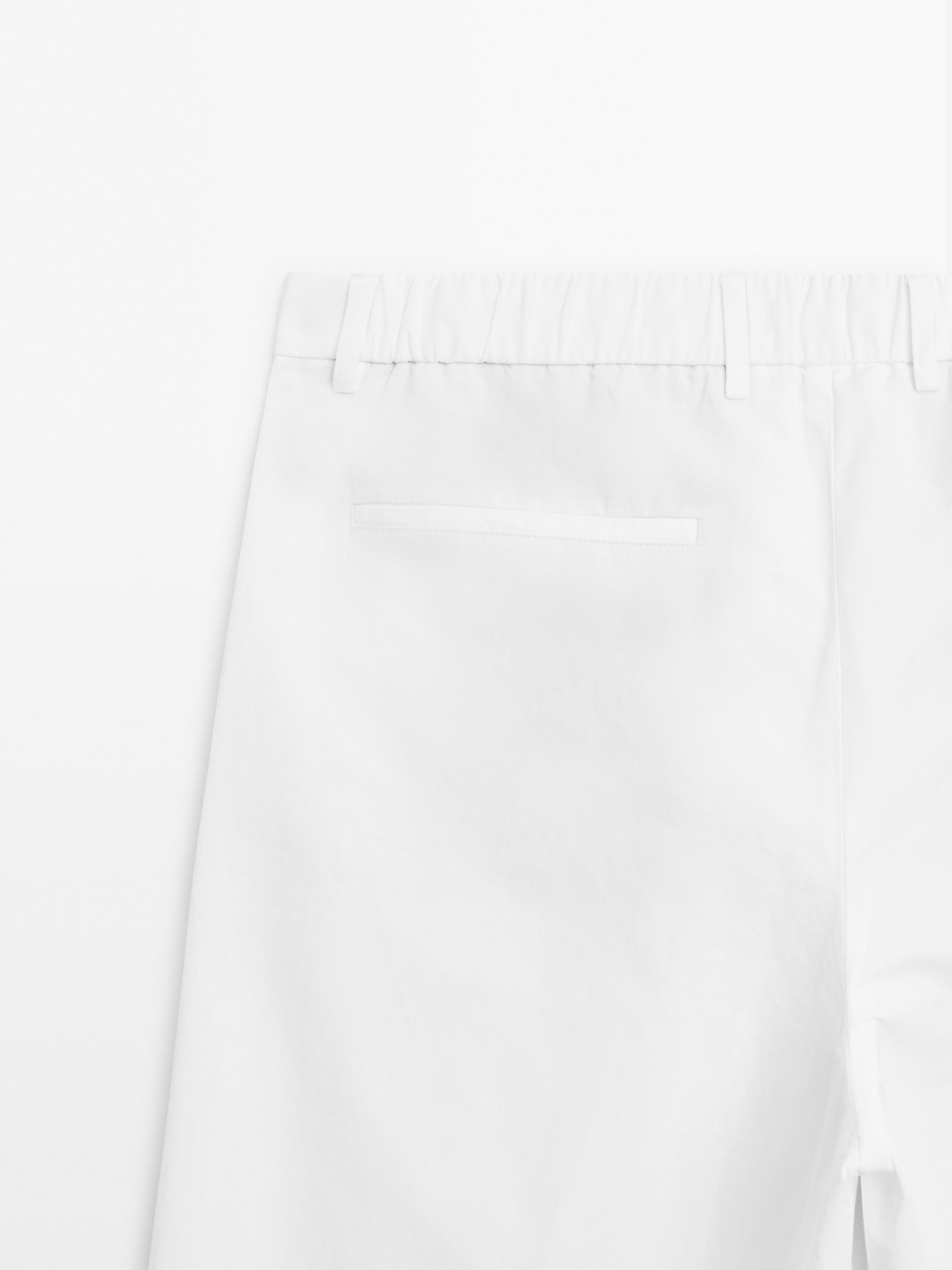 Balloon fit trousers with double darts