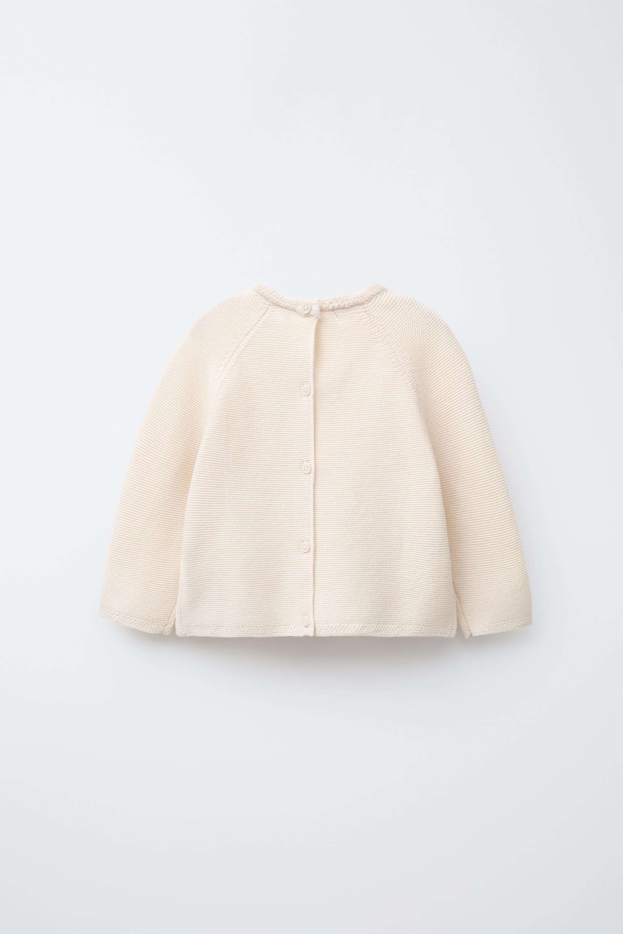 EMBROIDERED FLORAL LINKS KNIT SWEATER