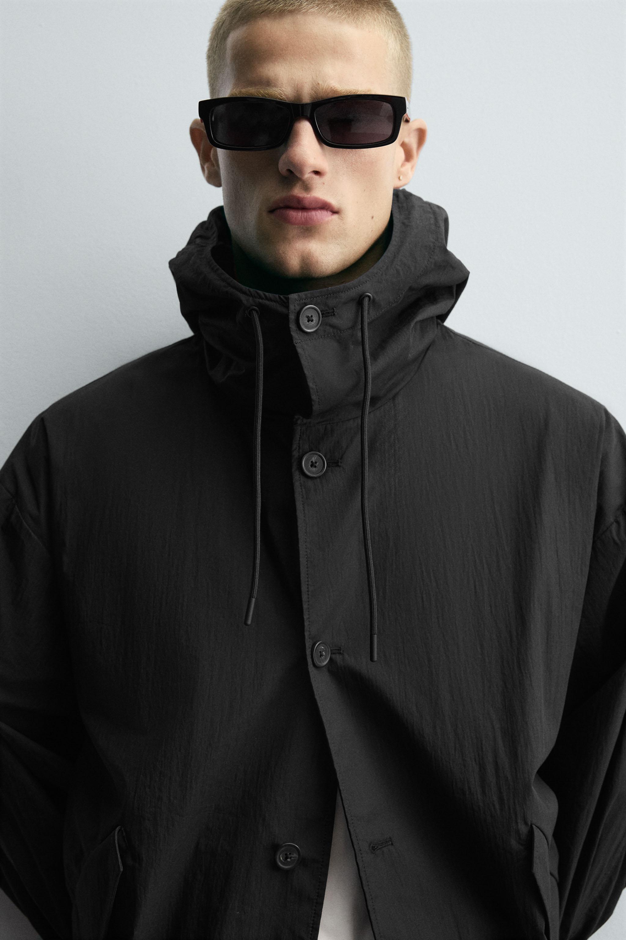 HOODED TECHNICAL JACKET