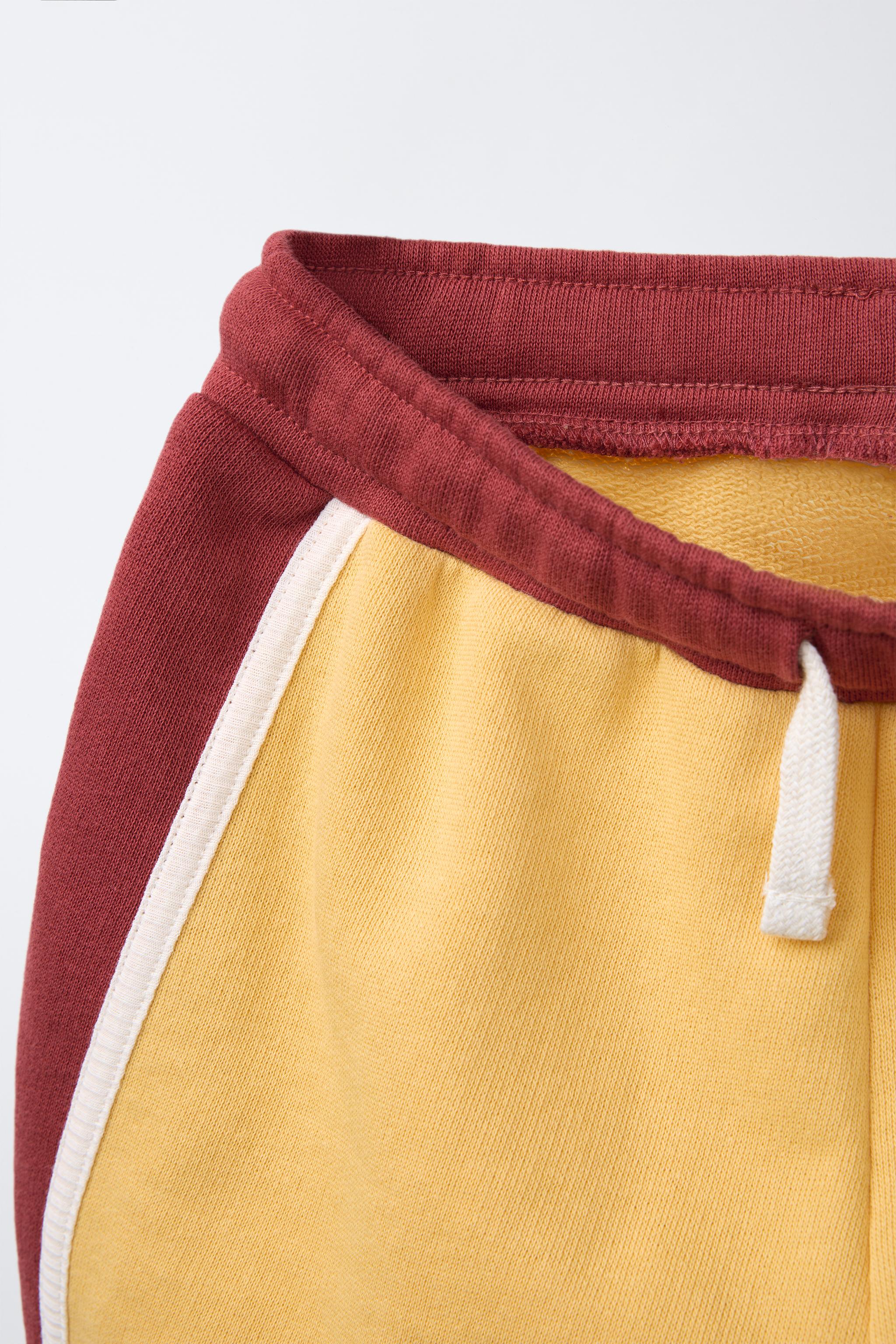 EMBROIDERED PLUSH SHORTS