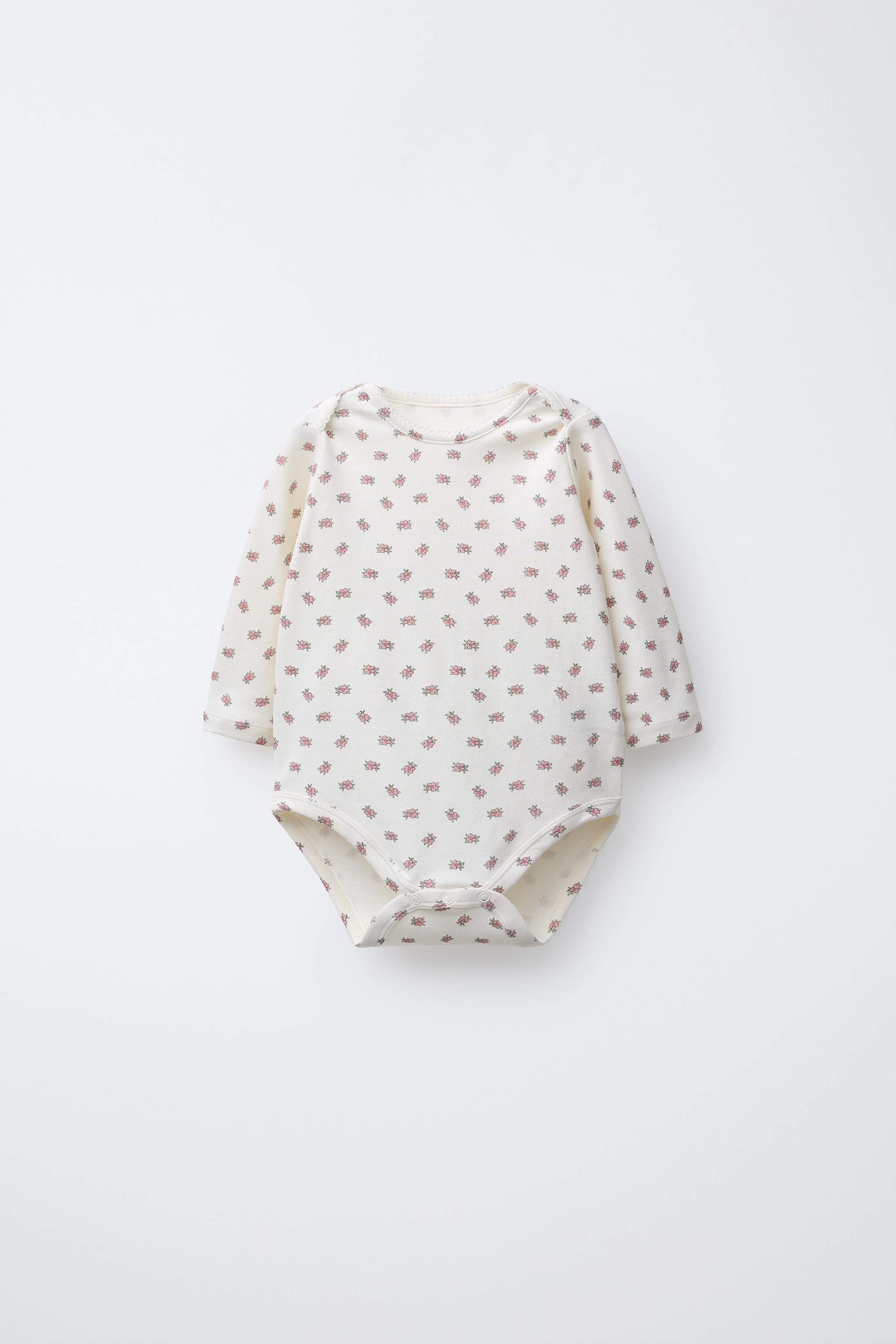 FIVE-PACK OF FLORAL BODYSUITS