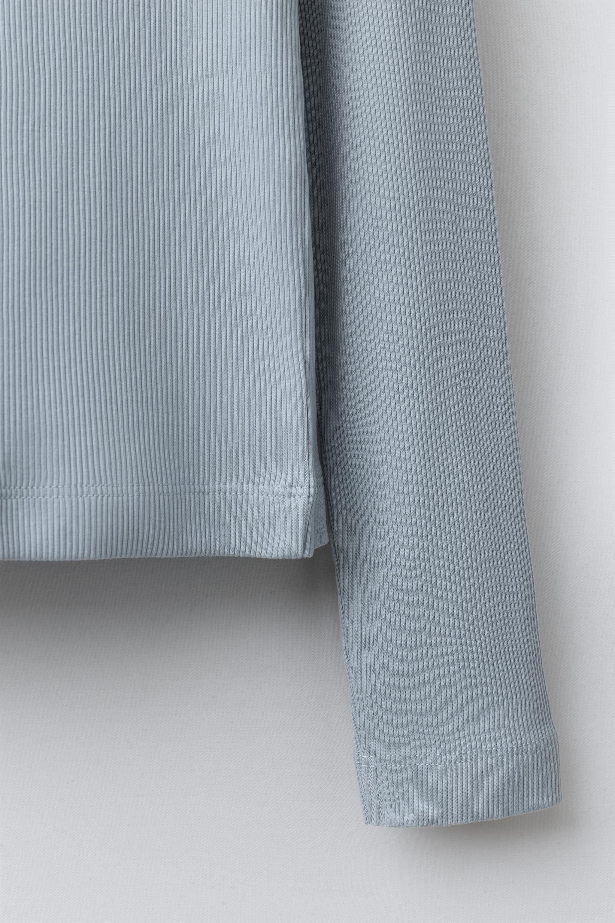 RIBBED T-SHIRT WITH BUTTONS AND CUT-OUT