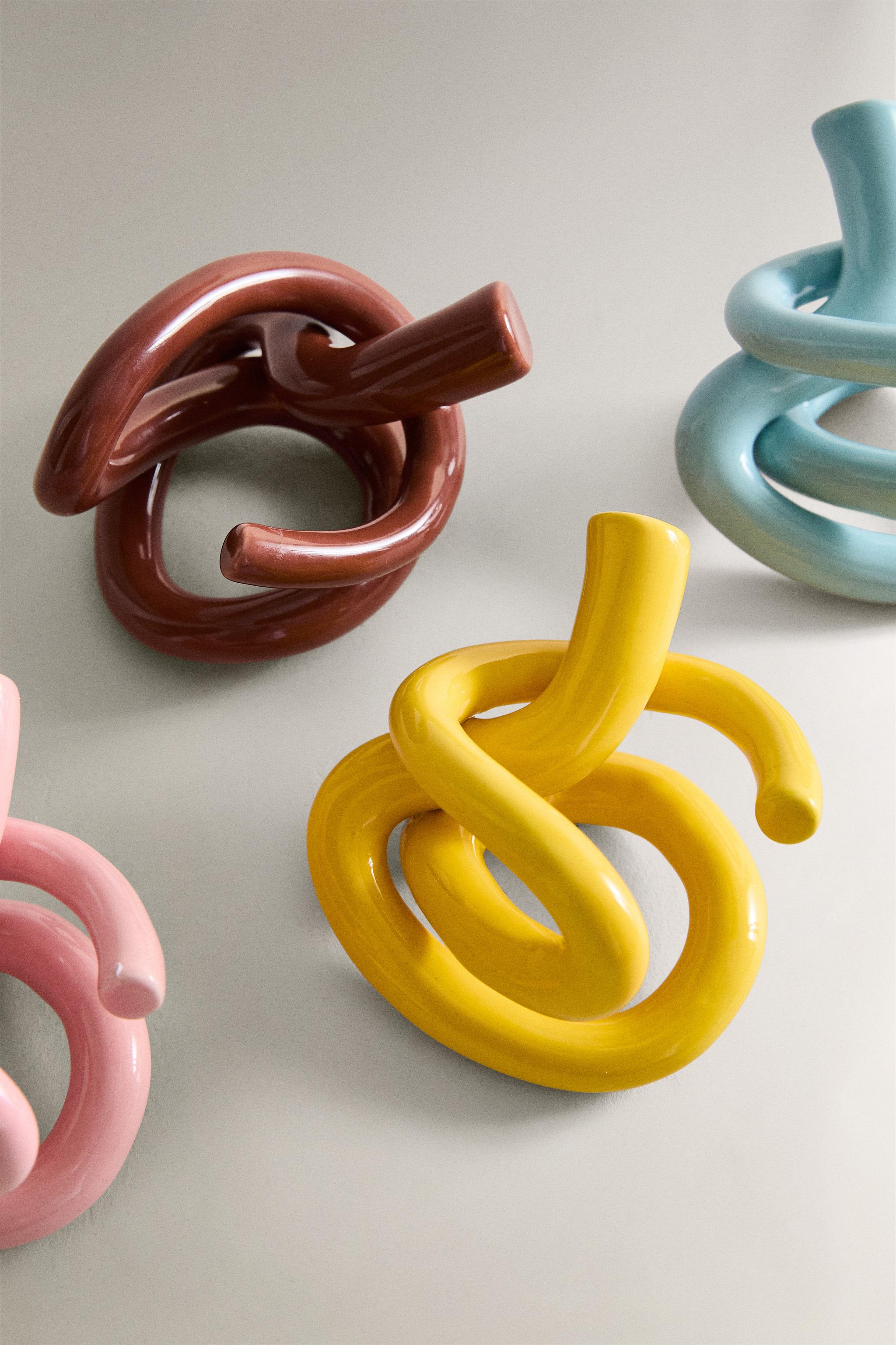 SET OF TEXTURED CERAMIC NAPKIN RINGS (SET OF 4) X COLLAGERIE