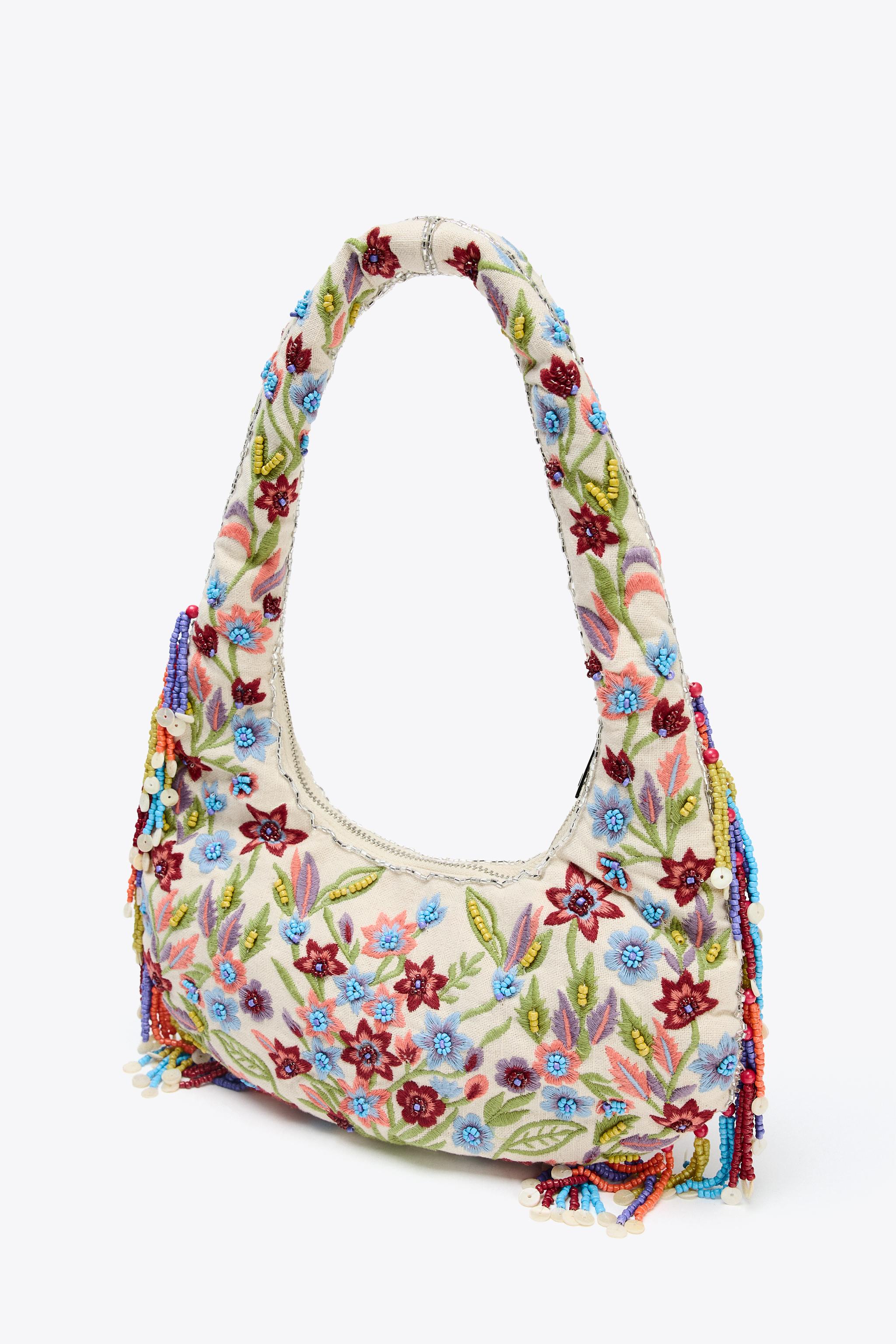 OVAL BAG WITH FLORAL EMBROIDERY
