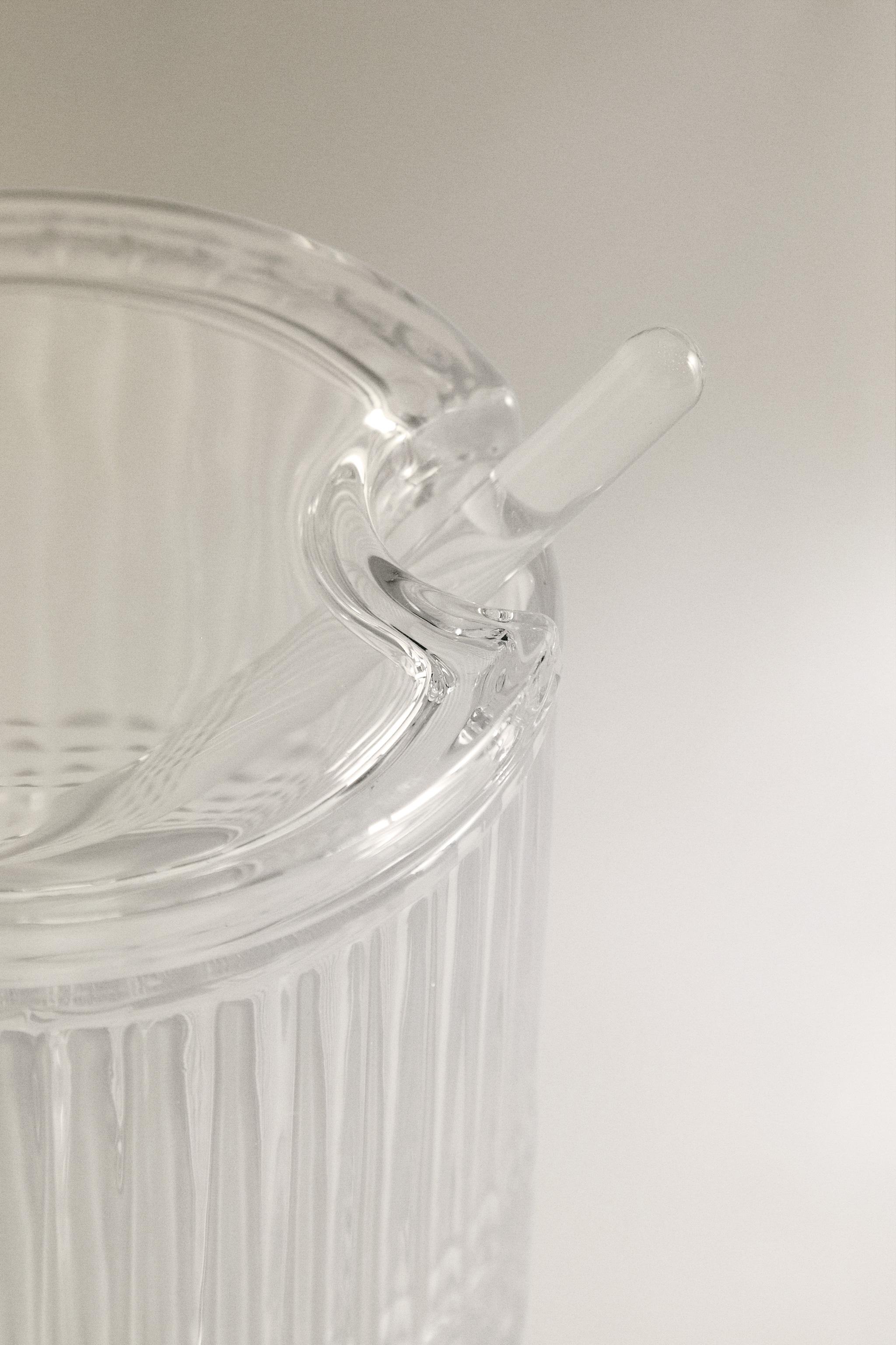 SUGAR BOWL WITH A RAISED GEOMETRIC DESIGN