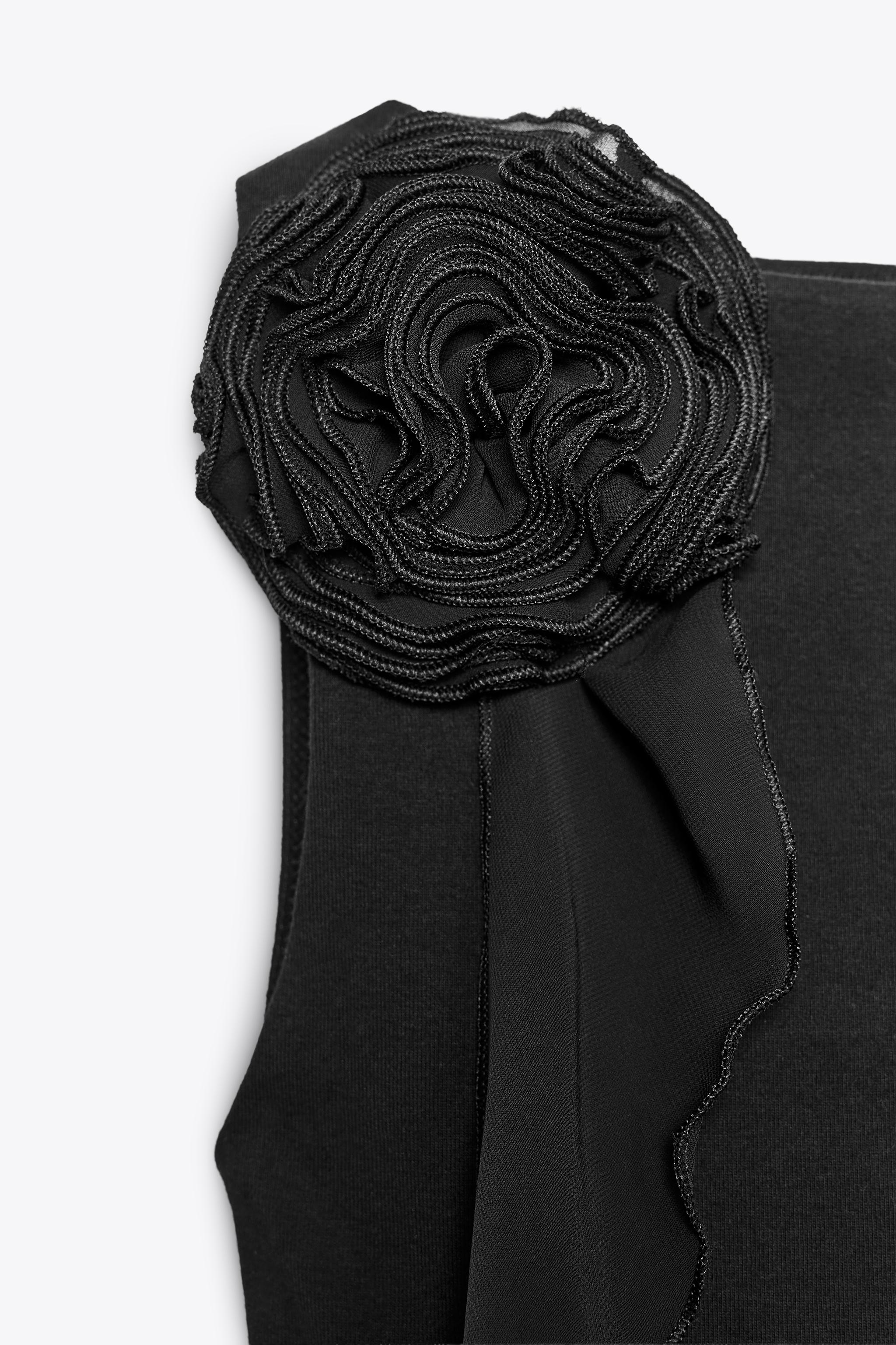 SLEEVELESS FLORAL TOP