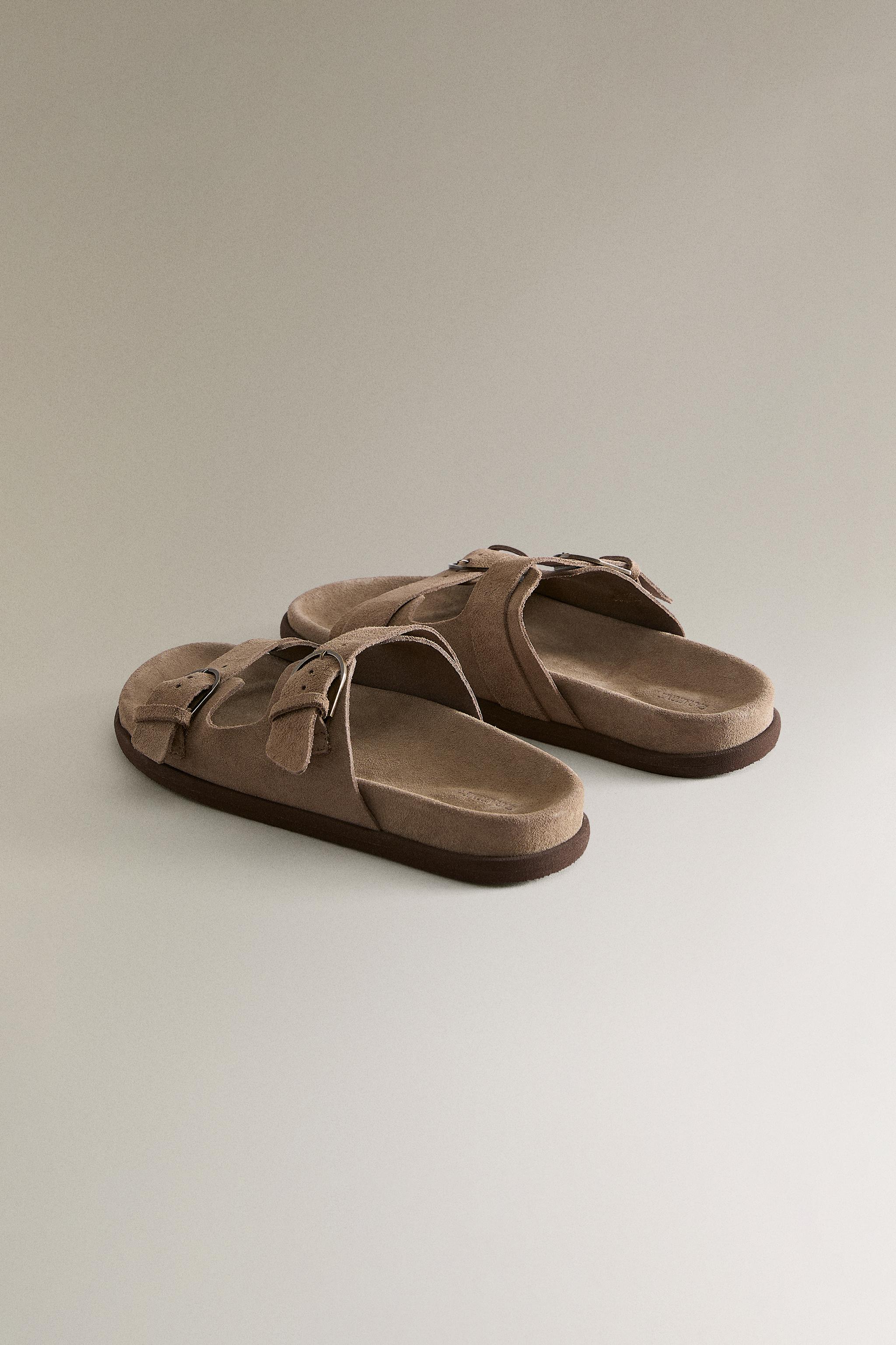 FLAT LEATHER SANDALS WITH BUCKLES