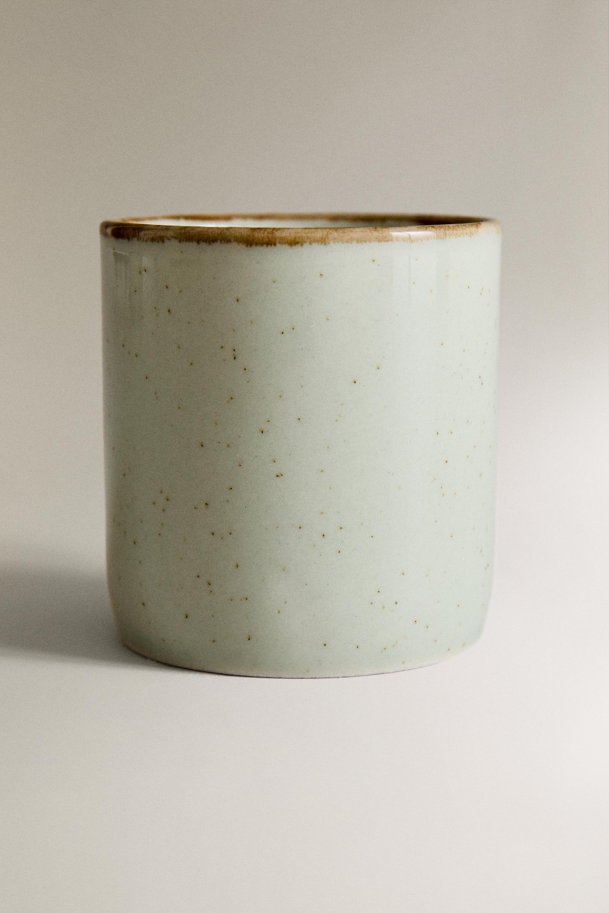 PORCELAIN MUG WITH ANTIQUE FINISH RIM