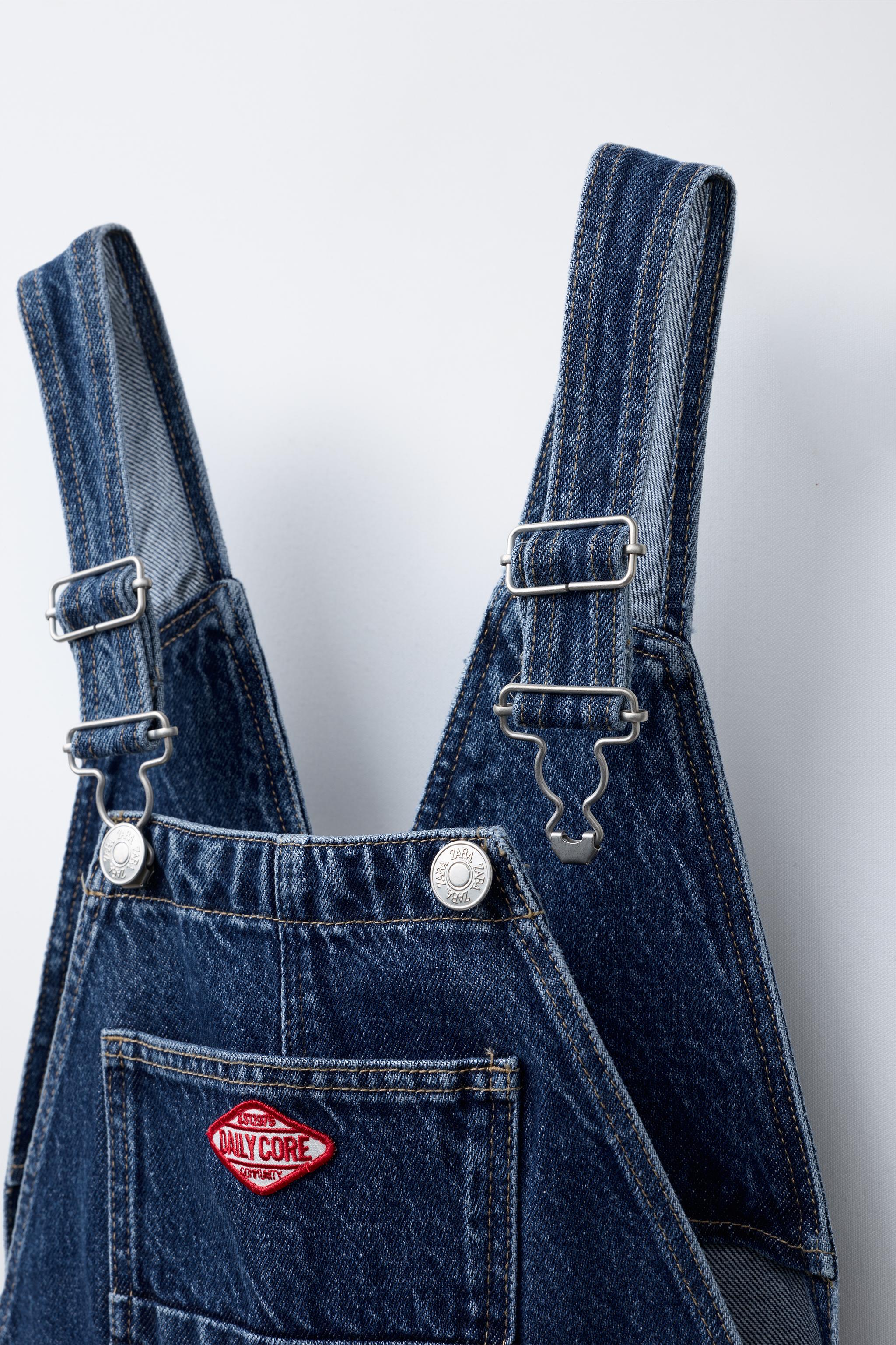 DENIM OVERALLS WITH LABEL