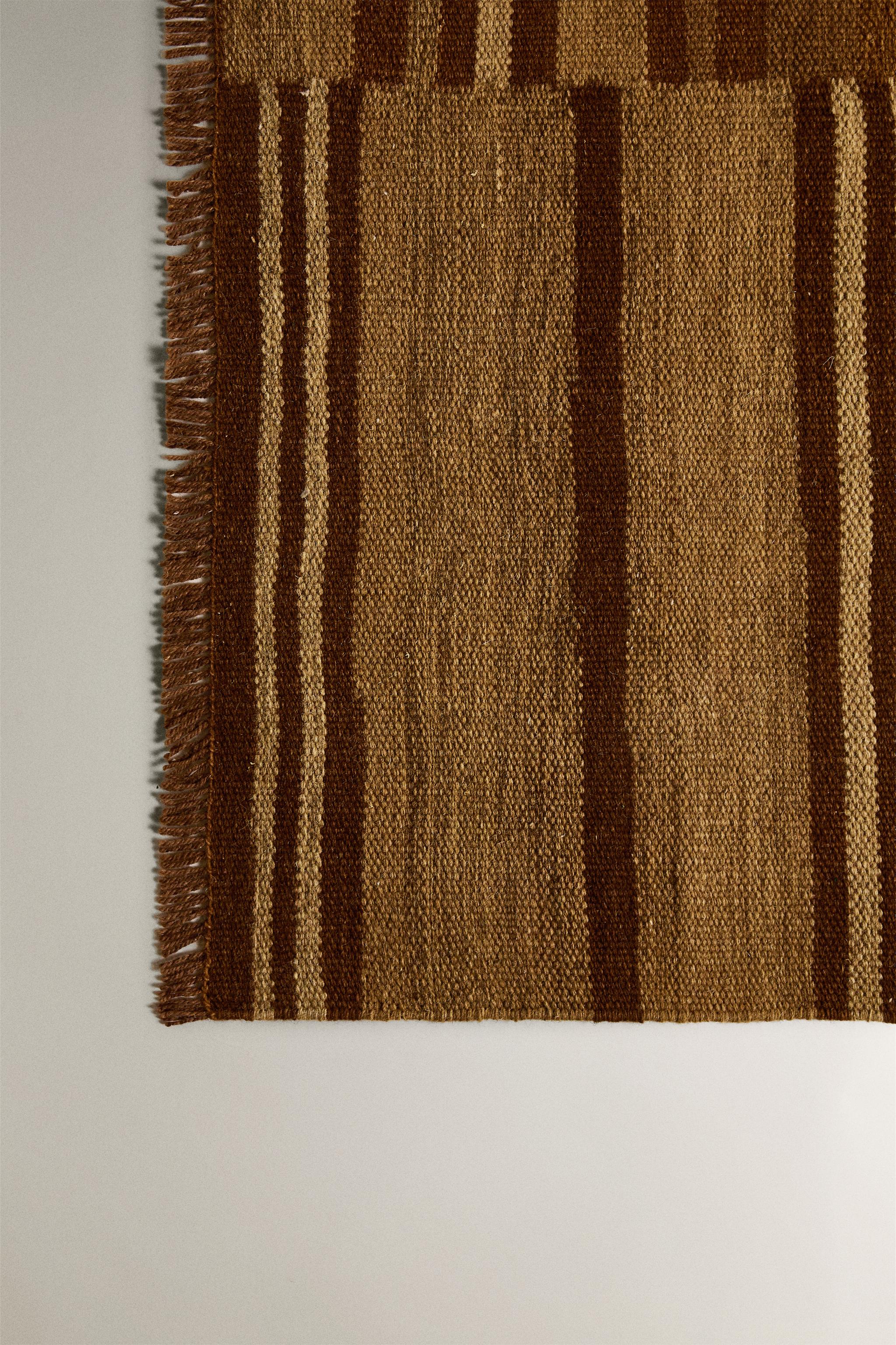 STRIPED AREA RUG WITH FRINGING