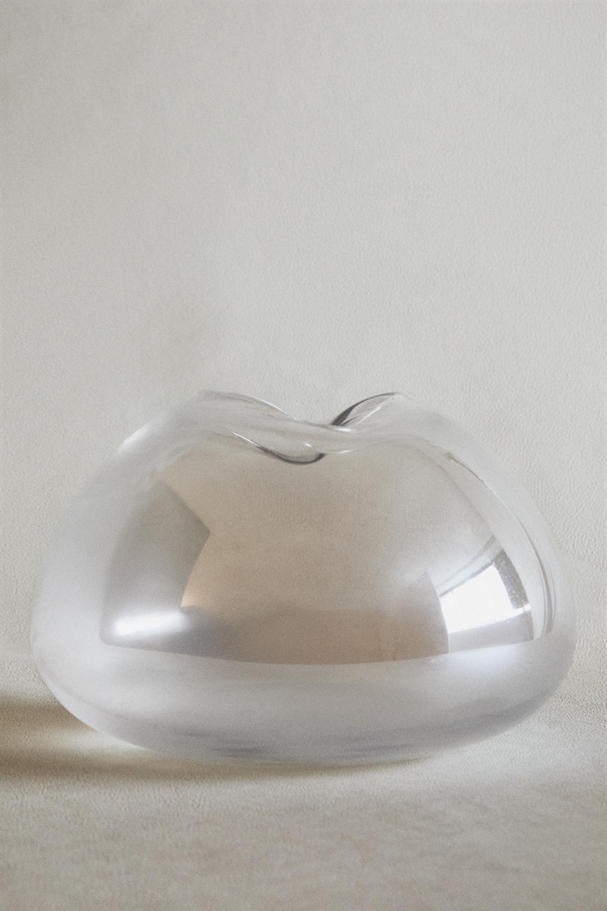 VASE WITH AN IRREGULAR LOW NECK