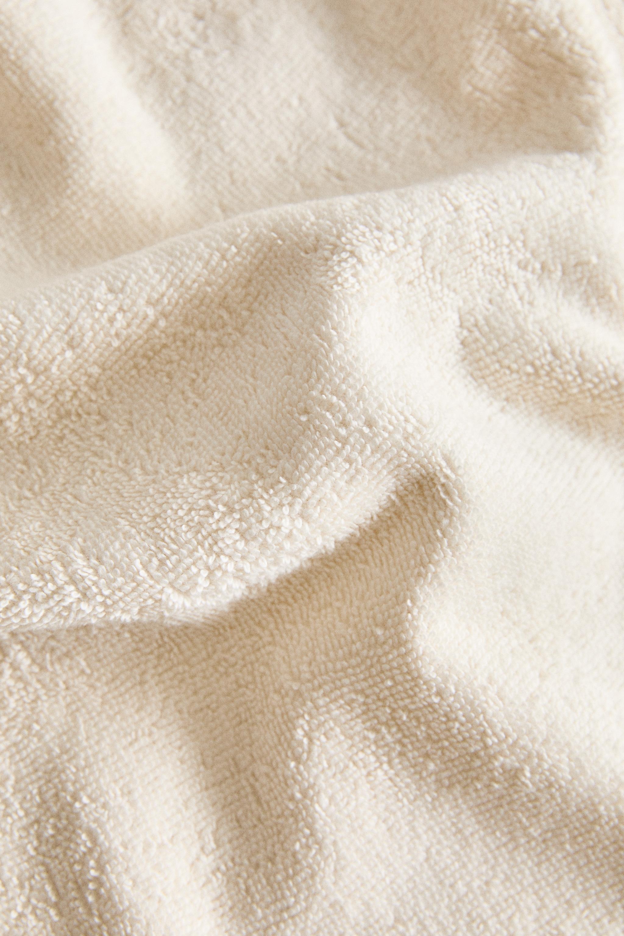 DOUBLE-TRIM COTTON TOWEL